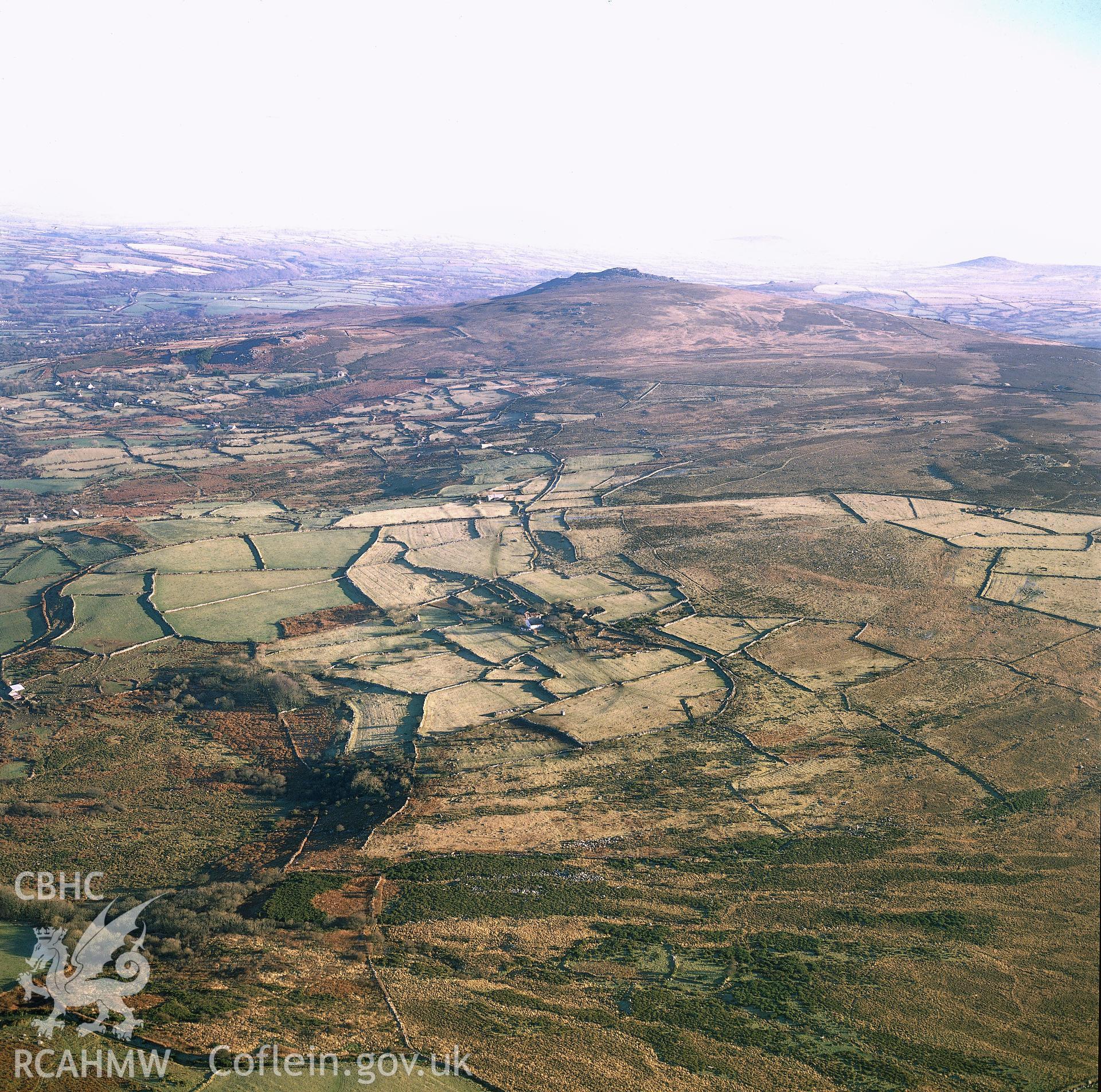 RCAHMW colour oblique aerial photograph of Carn Ingli Camp, taken by C R Musson, 1991.