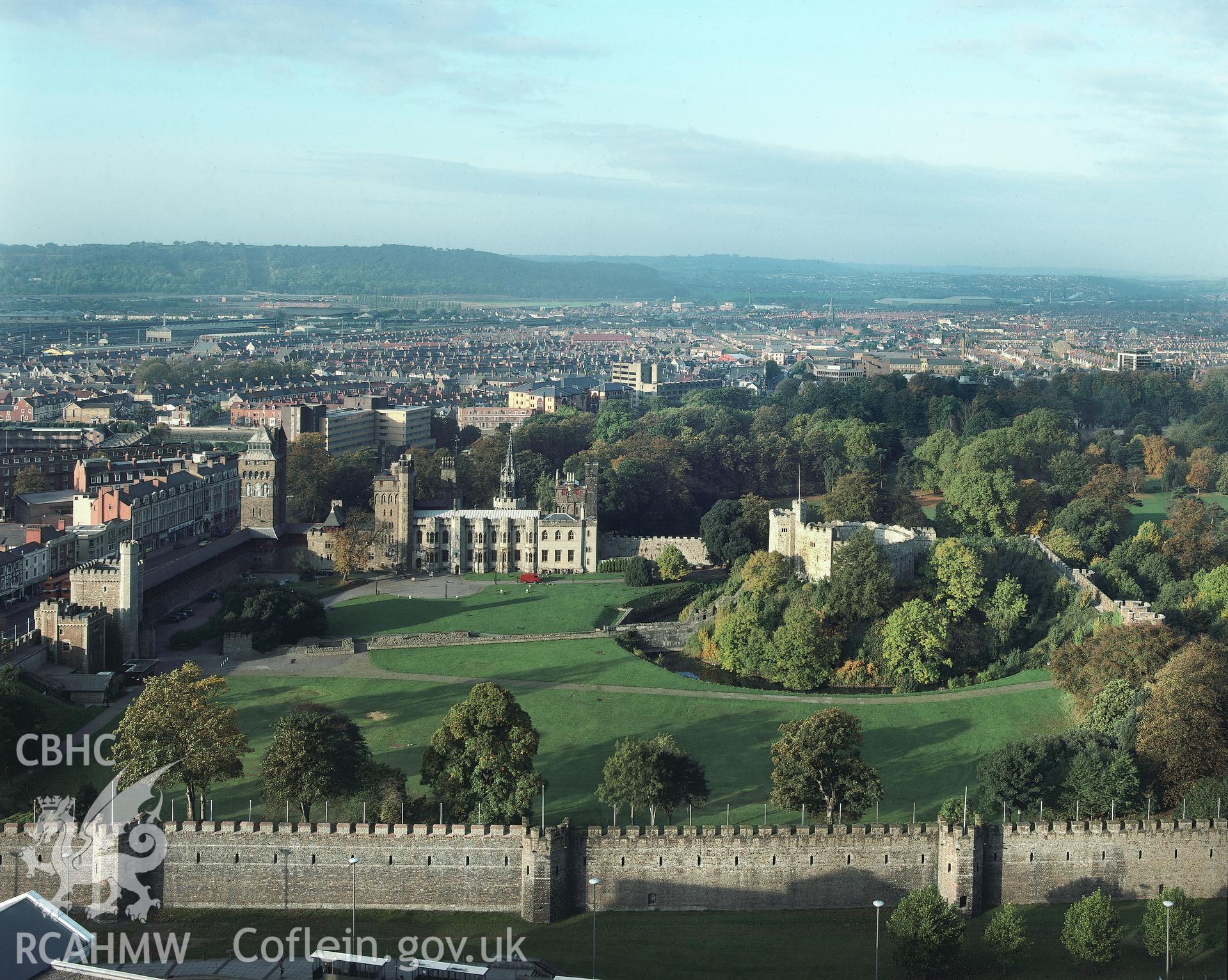 RCAHMW colour transparency of a general exterior view of Cardiff Castle, and castle walls, set in the Cardiff City landscape.