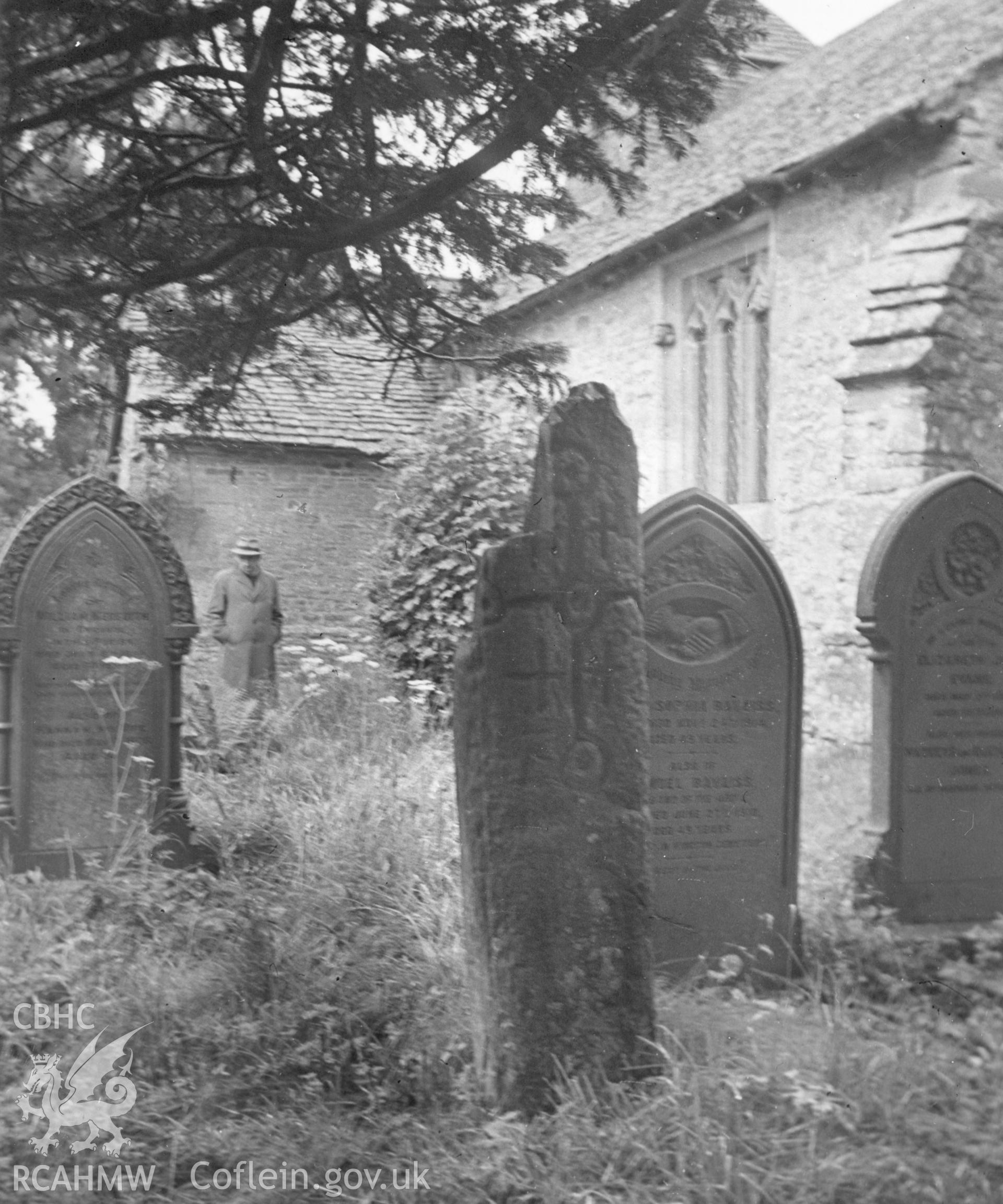 View of cross incised pillar stone in the churchyard of St Michael's Church, Bryngwyn.
