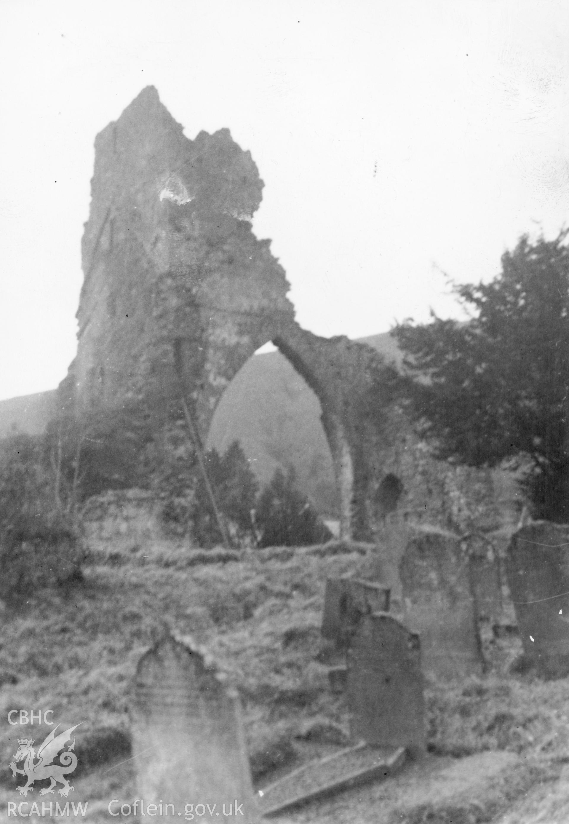 Detail of high arch with long ladder at the side, presumably in preparation for repair and restoration at Talley Abbey.