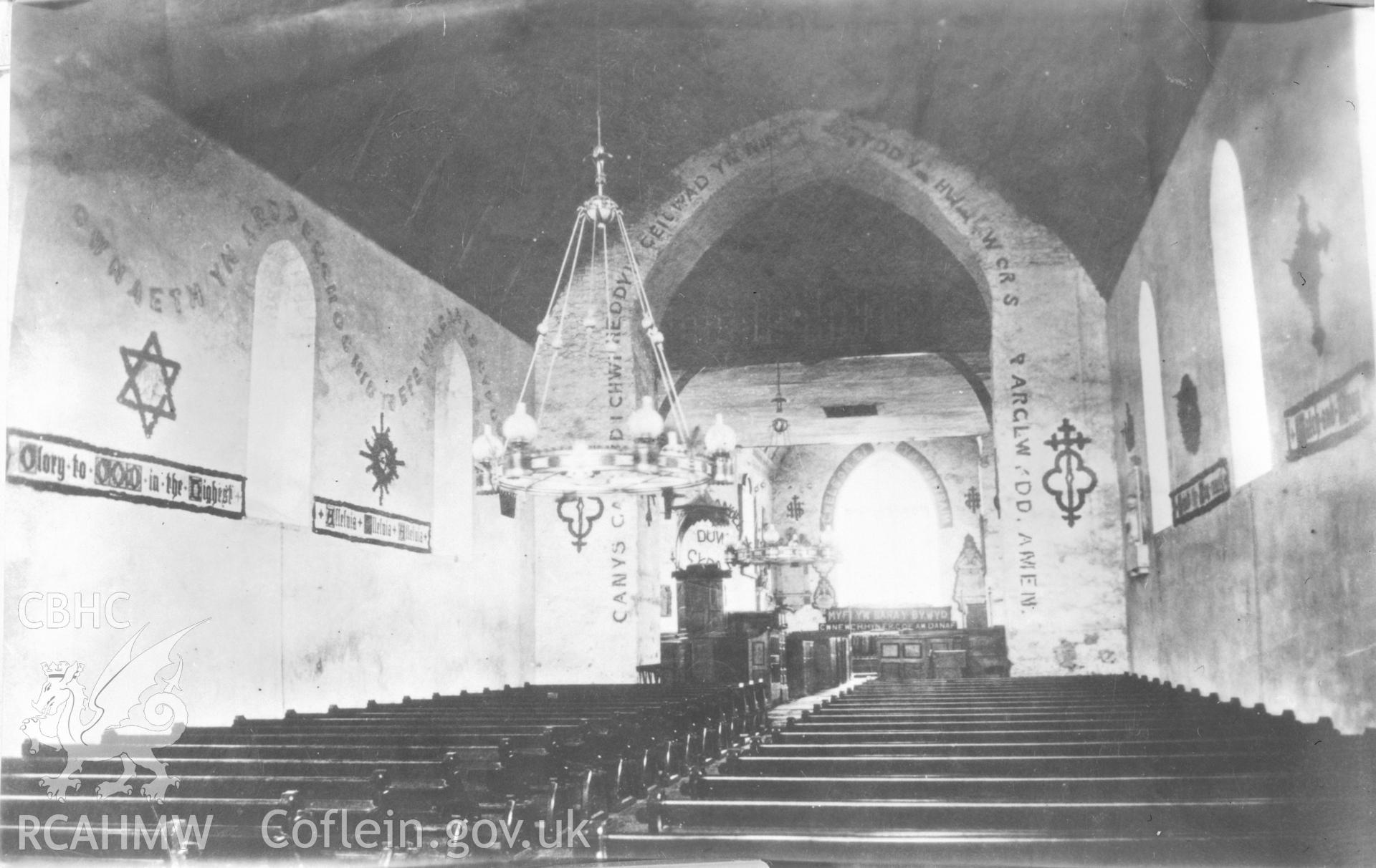 Black and white acetate negative showing an interior view of Llanbadarn Fawr church prior to restoration.