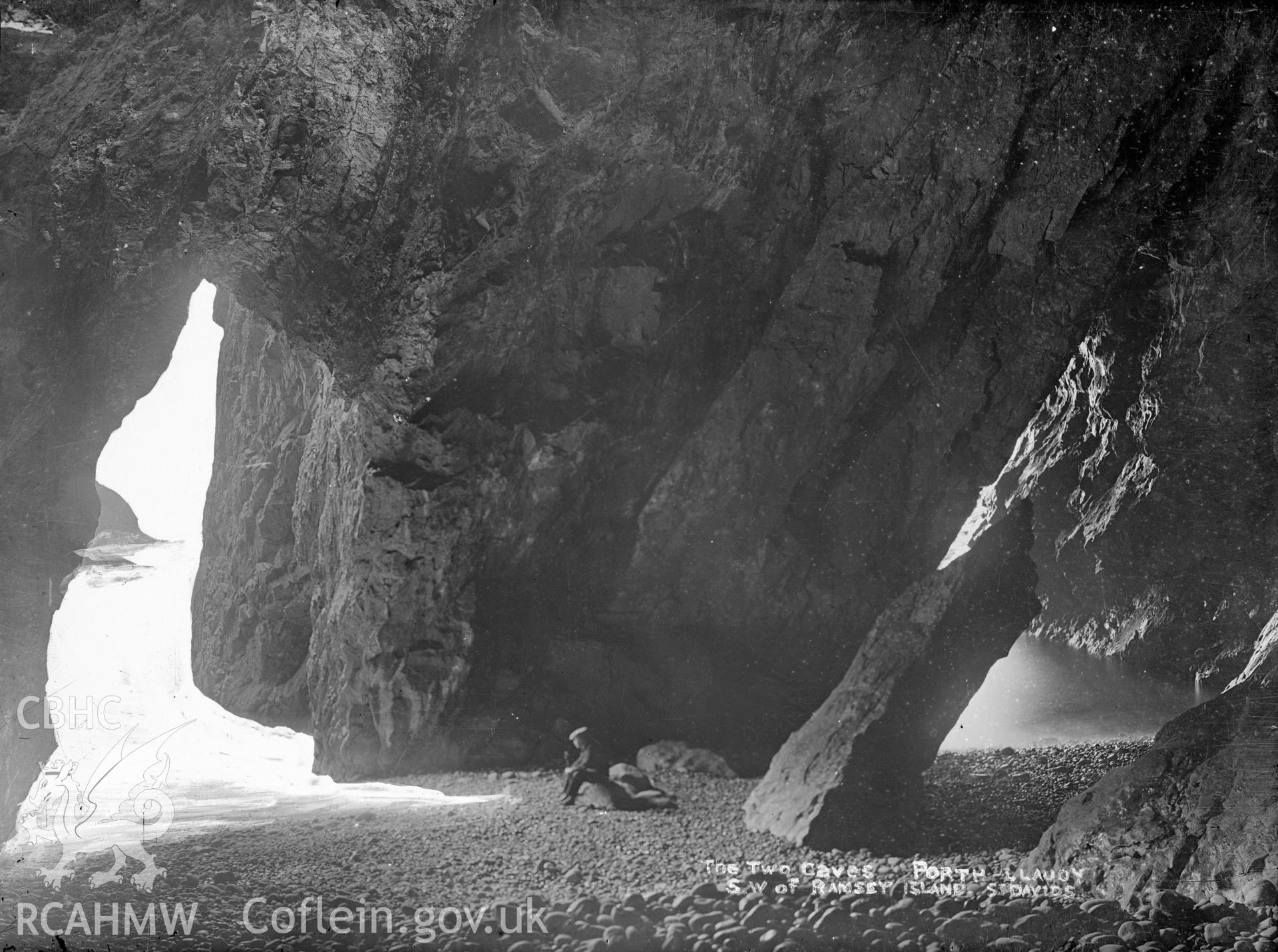 Black and white glass negative showing "The Two Caves at Porth-Llauoy SW of Ramsey Island, St Davids" Porth Lleuog, Ramsey Island.