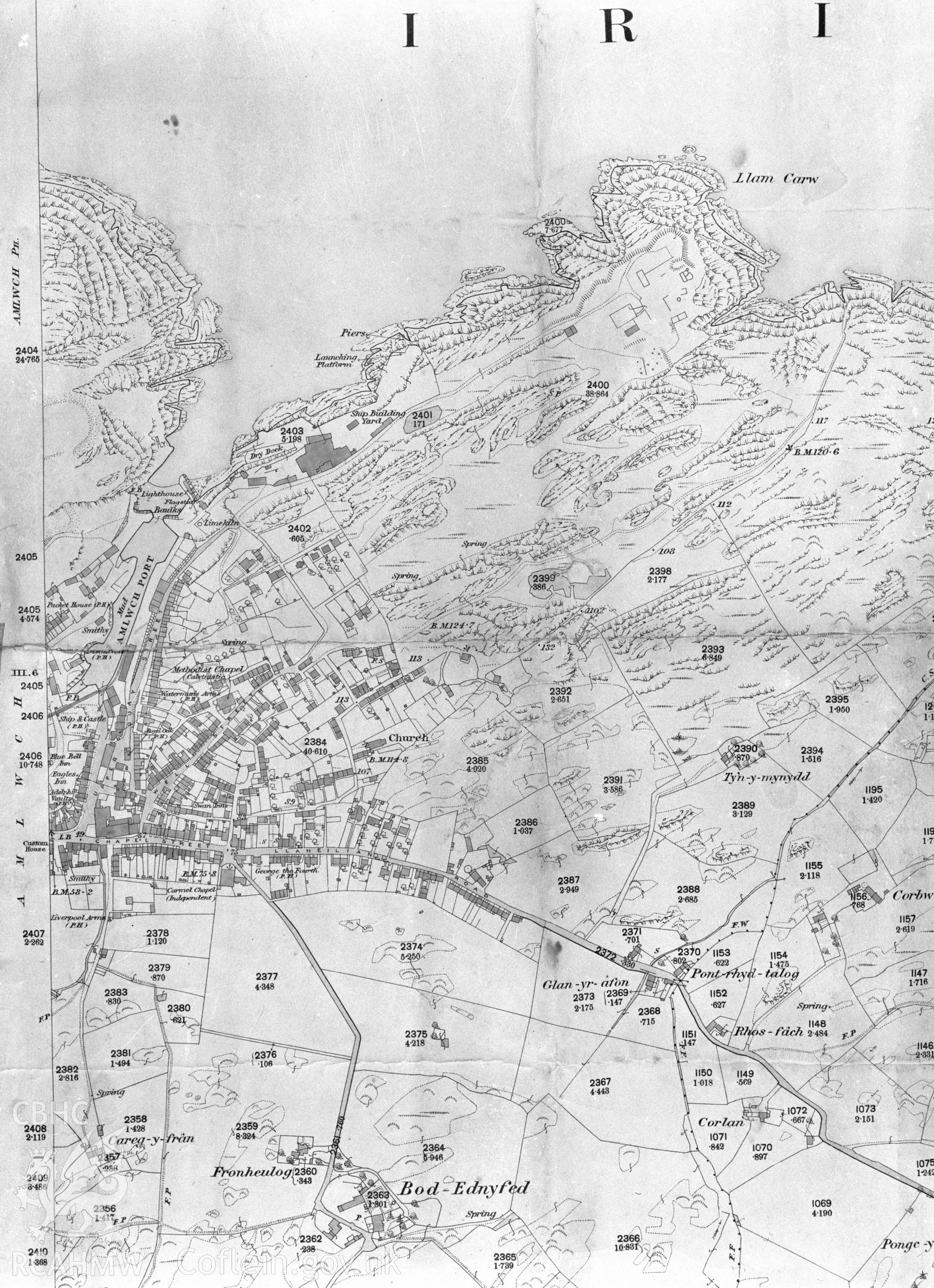 Black and white acetate negative showing early maps of the area around Amlwch.