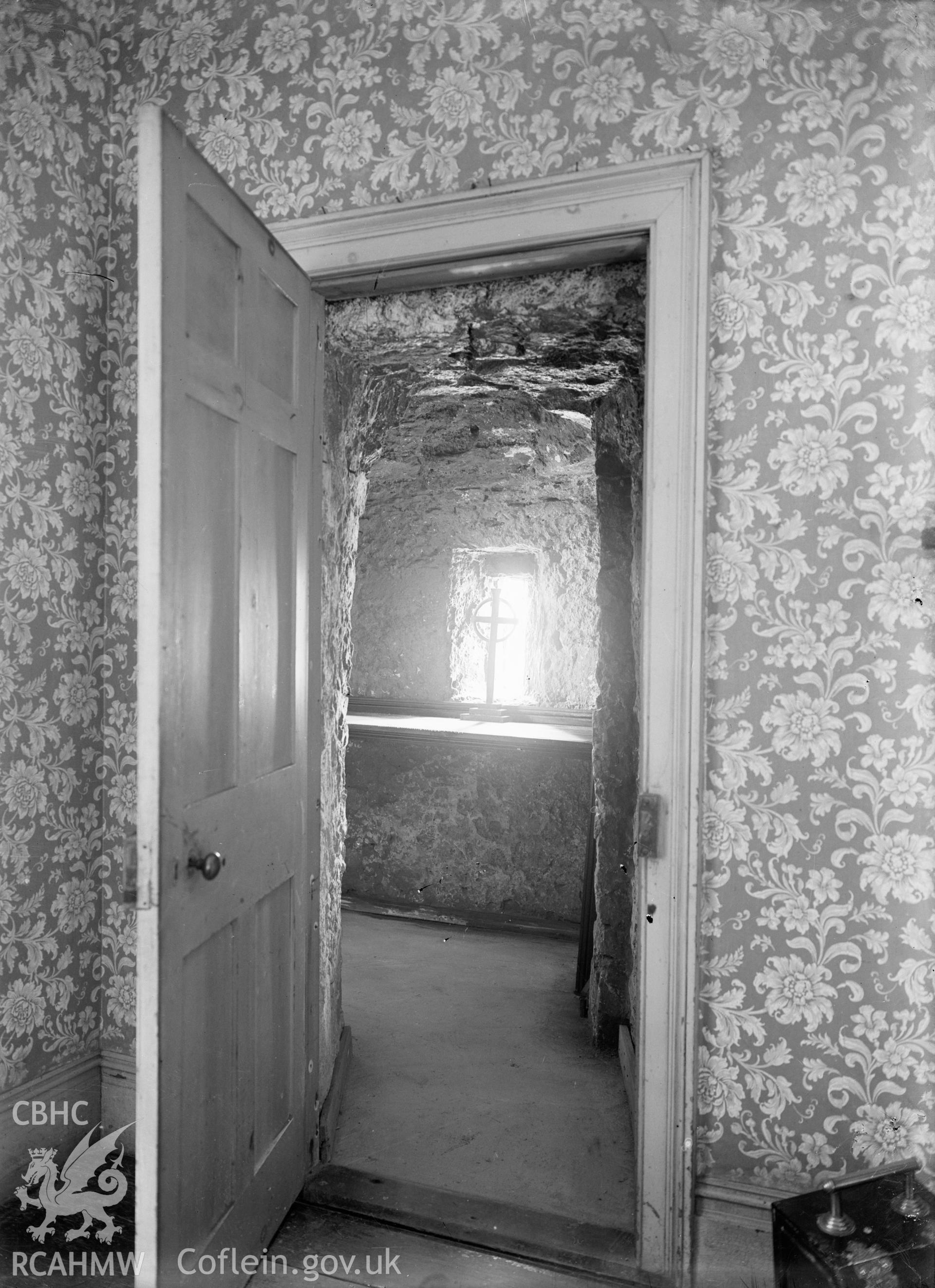 Black and white glass negative showing interior doorway in unknown location, from National Buildings Record.