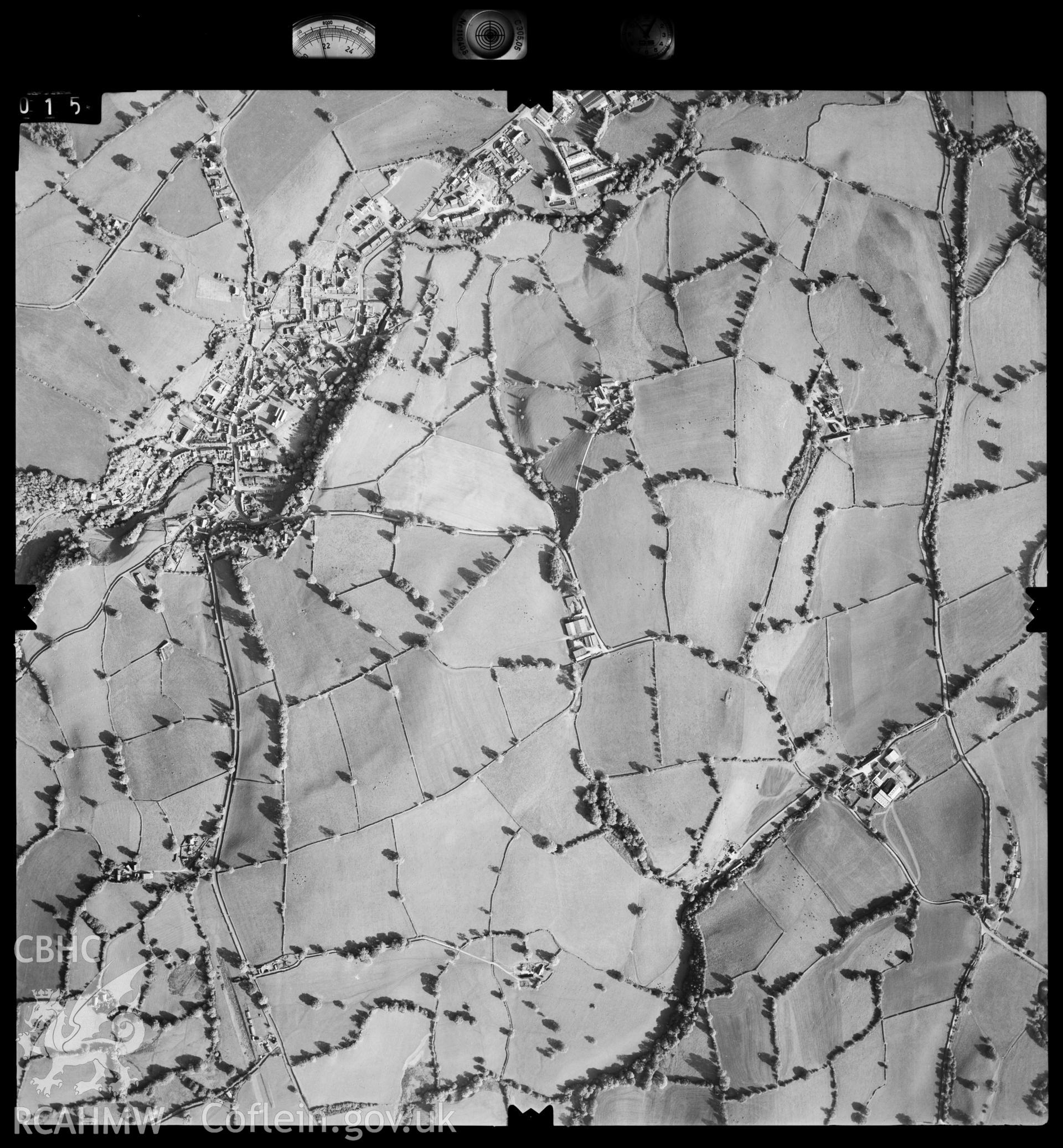 Digitized copy of an aerial photograph showing Llanrhaiadr ym Mochnant area, taken by Ordnance Survey, 1994.