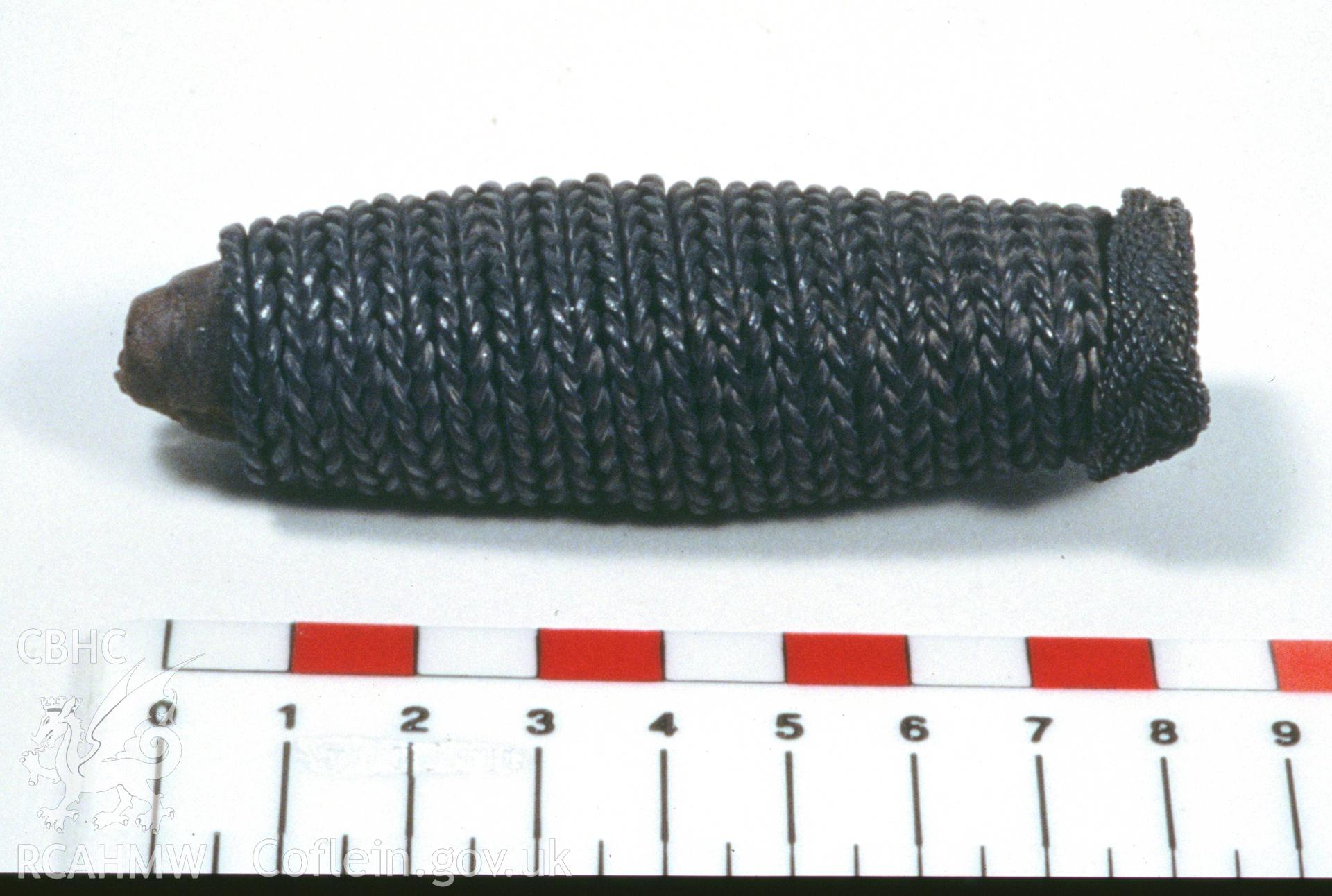 Colour slide showing find from site, sword grip, from a survey of the Mary designated shipwreck, courtesy of National Museums, Liverpool (Merseyside Maritime Museum)