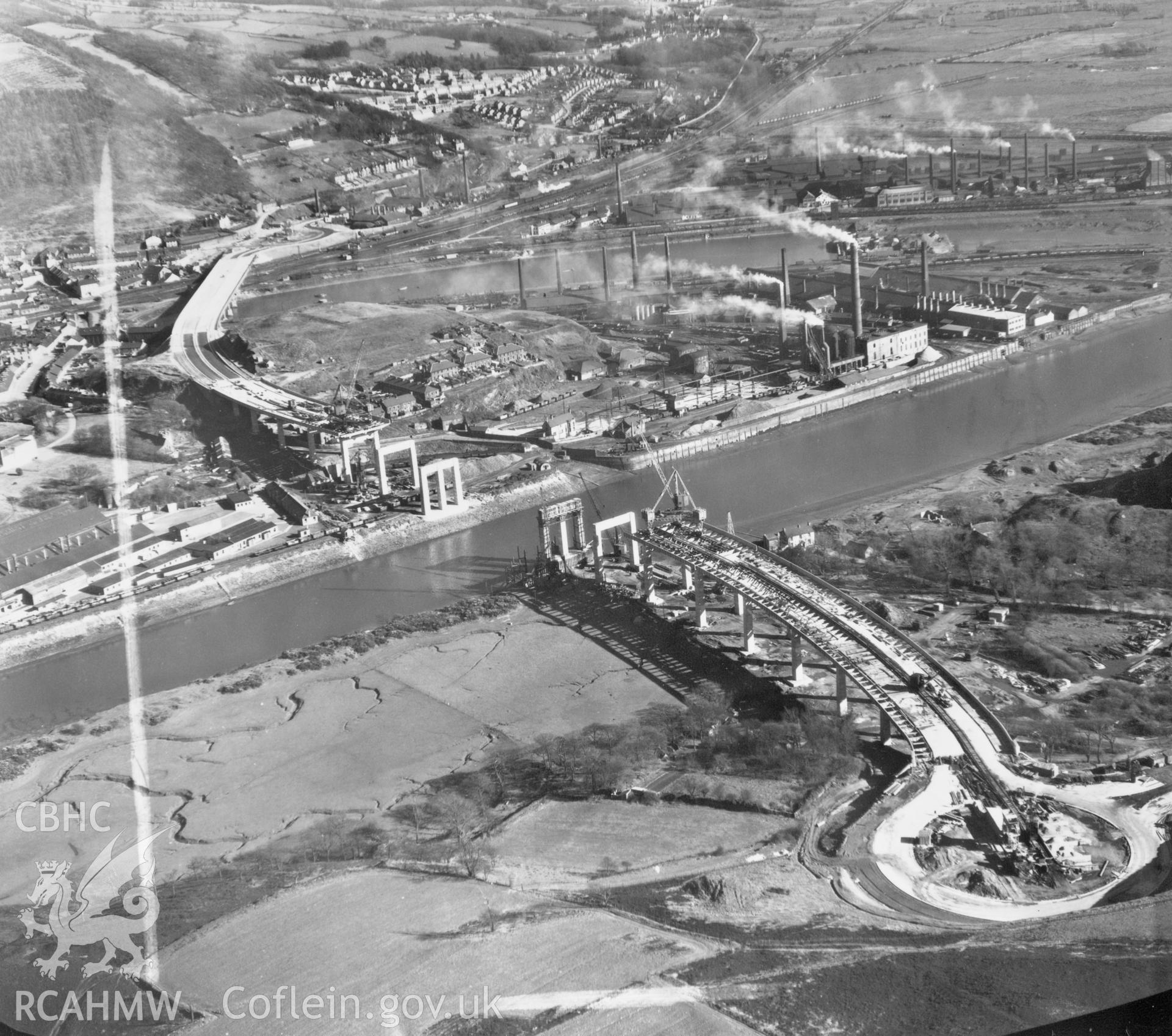Black and white oblique aerial photograph showing Neath By-pass Bridge, from Aerofilms album no W27(Glamorgan M-O), taken by Aero Pictorial Ltd and dated 1953.