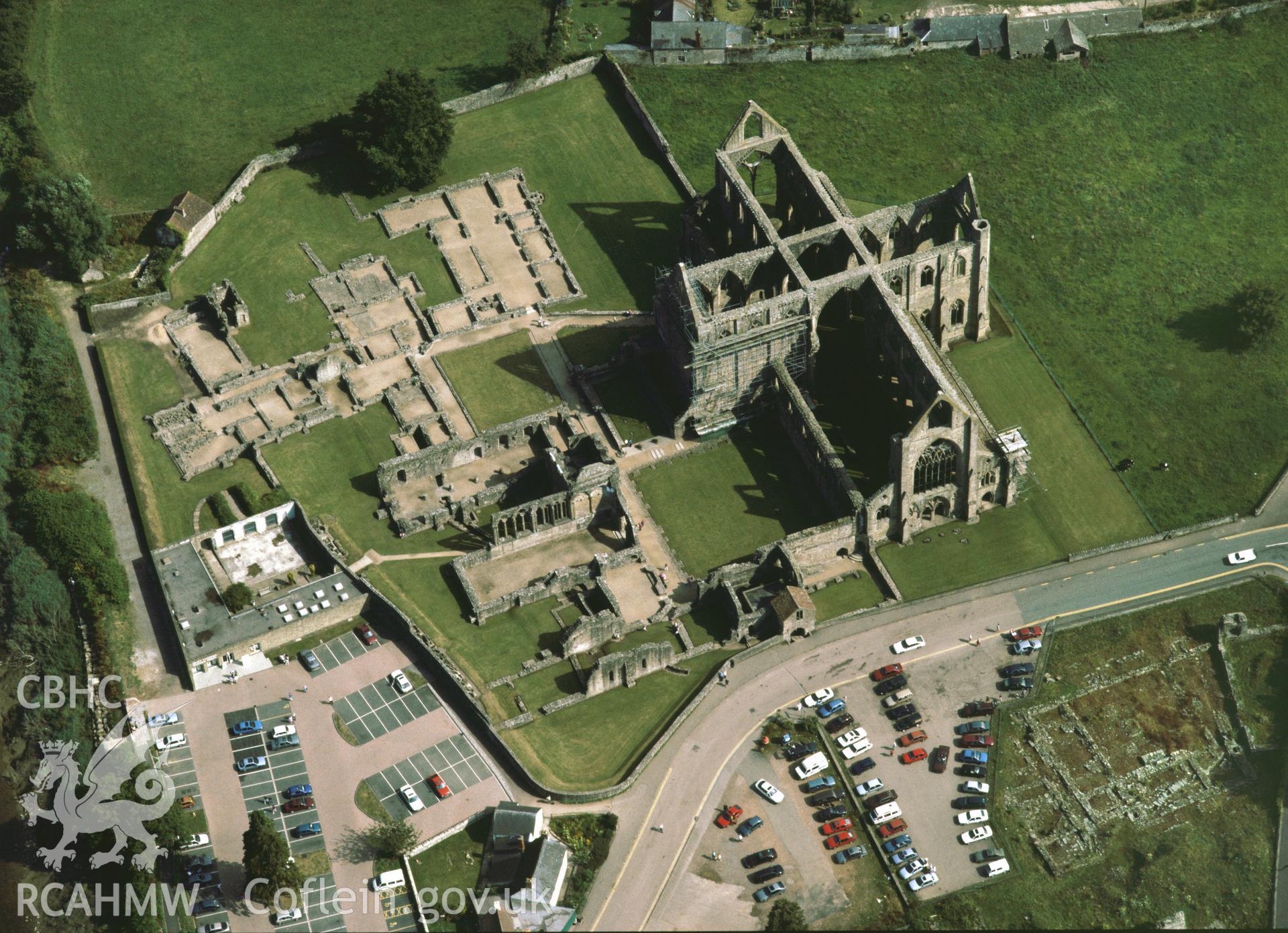 RCAHMW colour oblique aerial photograph of Tintern Abbey, taken by C.R. Musson, 18/07/94