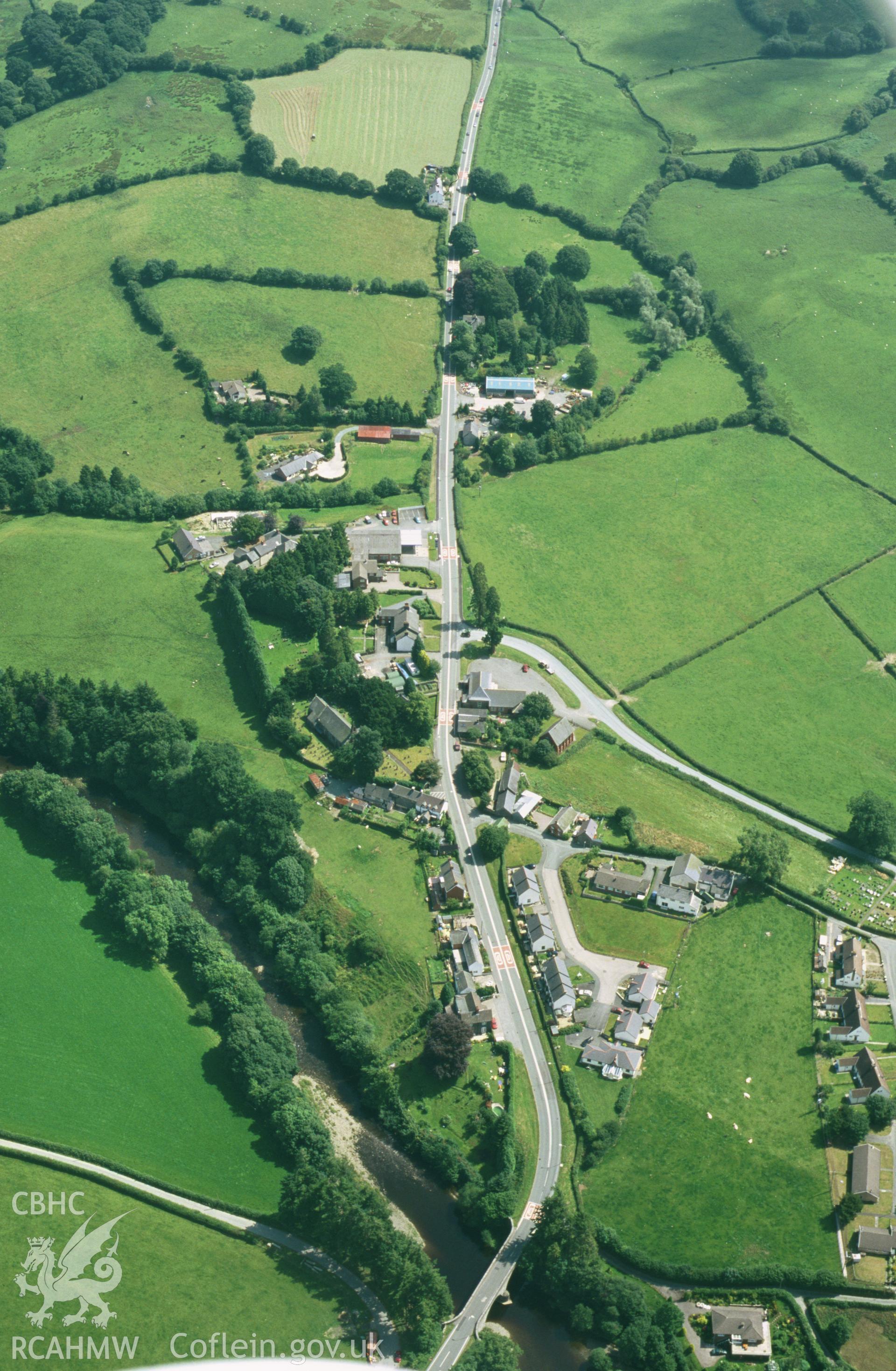 Slide of RCAHMW colour oblique aerial photograph of Llanerfyl aken by T.G. Driver, 2001.