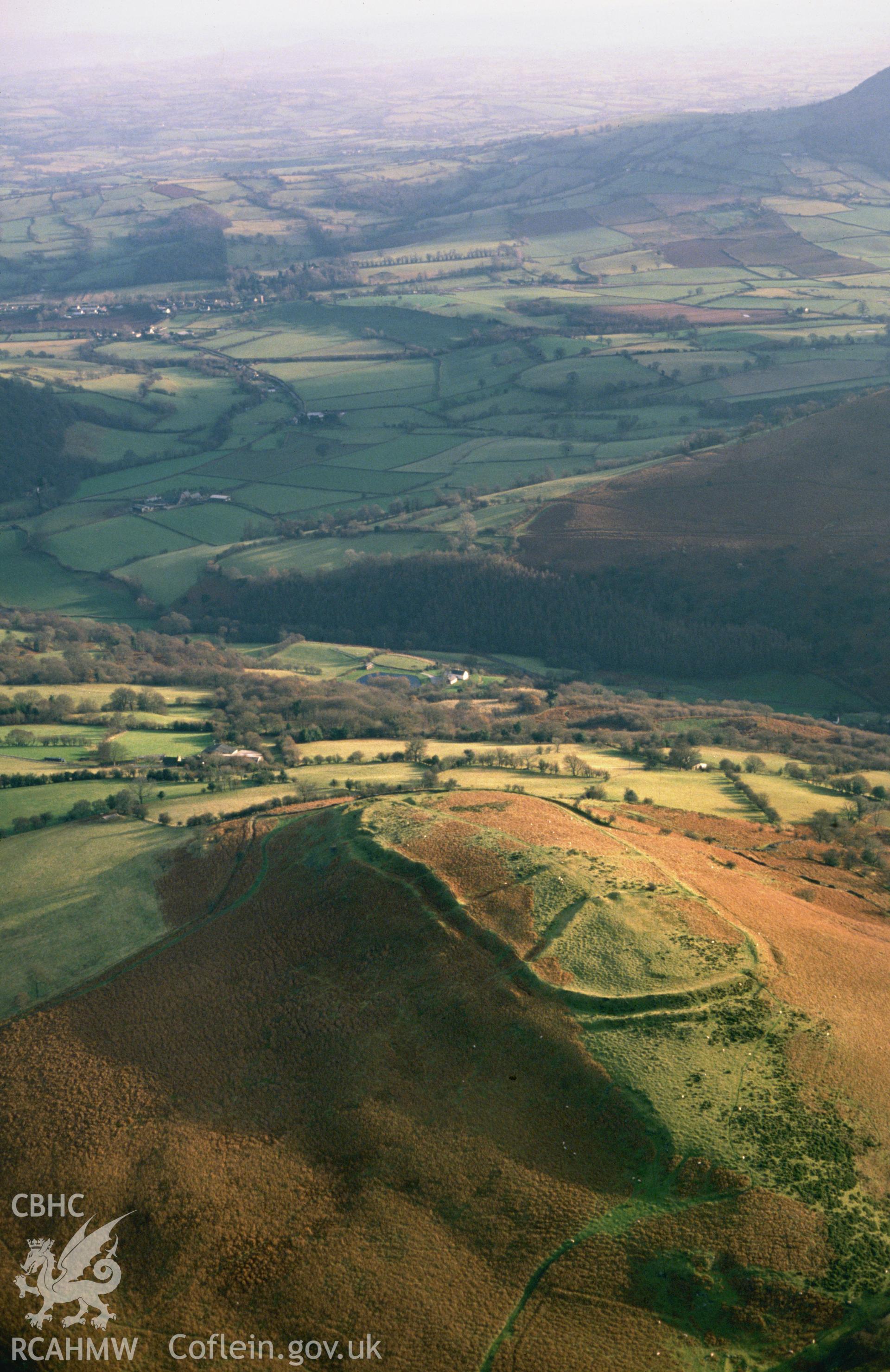 Slide of RCAHMW colour oblique aerial photograph of Twyn-y-gaer Camp, taken by C.R. Musson, 7/12/1988.