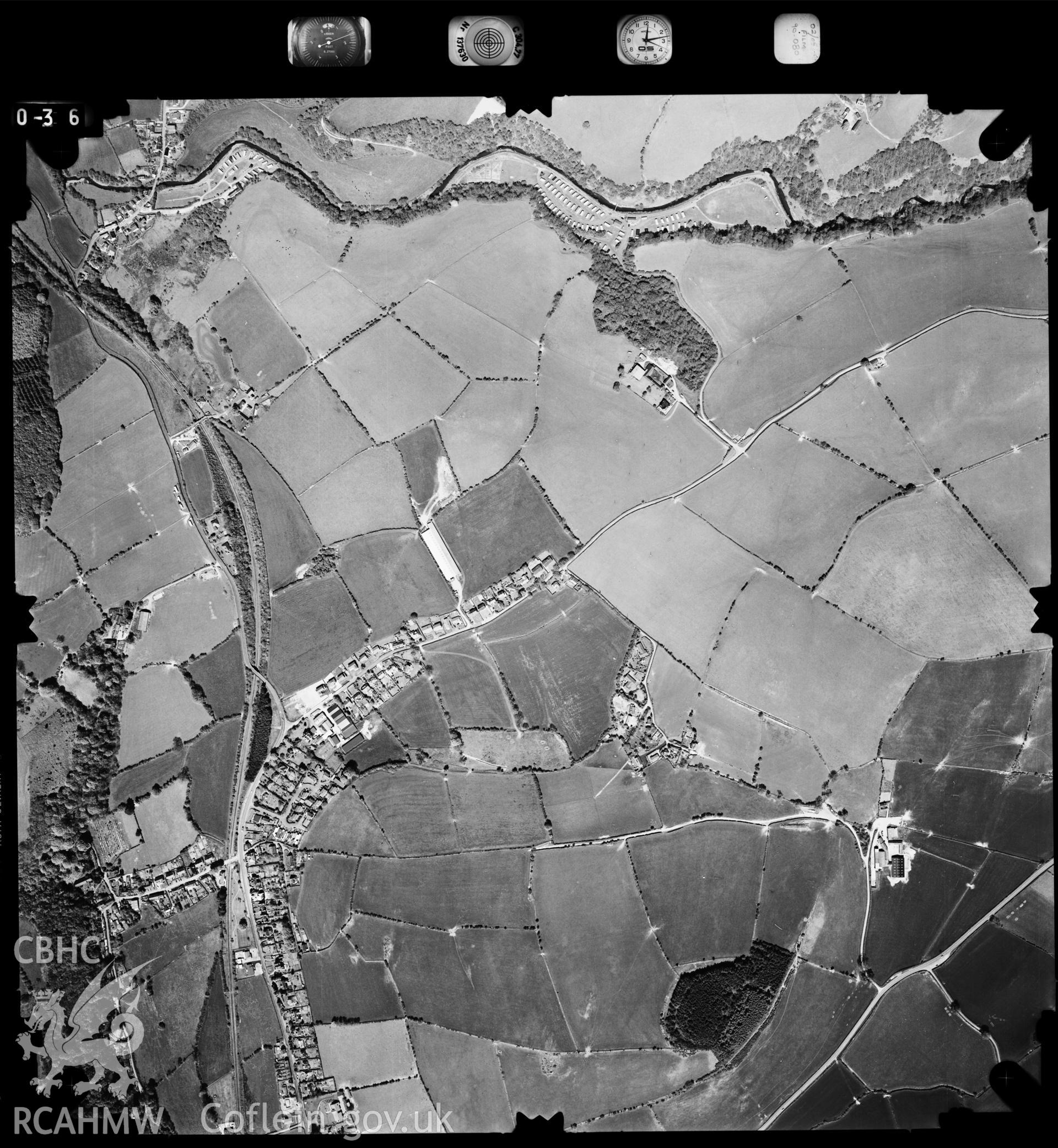 Digitized copy of an aerial photograph showing Llandre, taken by Ordnance Survey, 1990.
