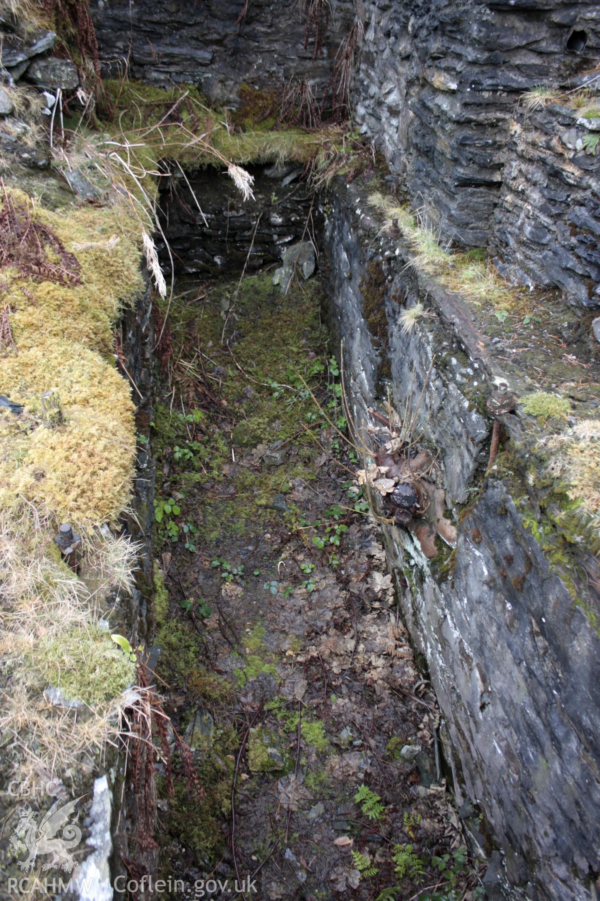 Ystrad Einion metal mine.  Looking south-west along wheel pit 3.
