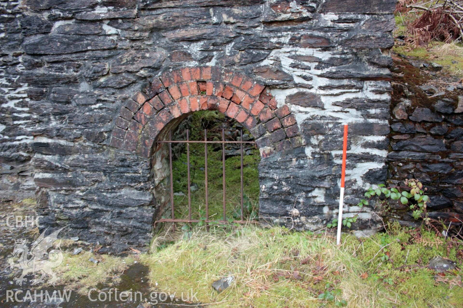 Ystrad Einion metal mine.  Tail race arch in front (north-east) face of wheel pit 2.