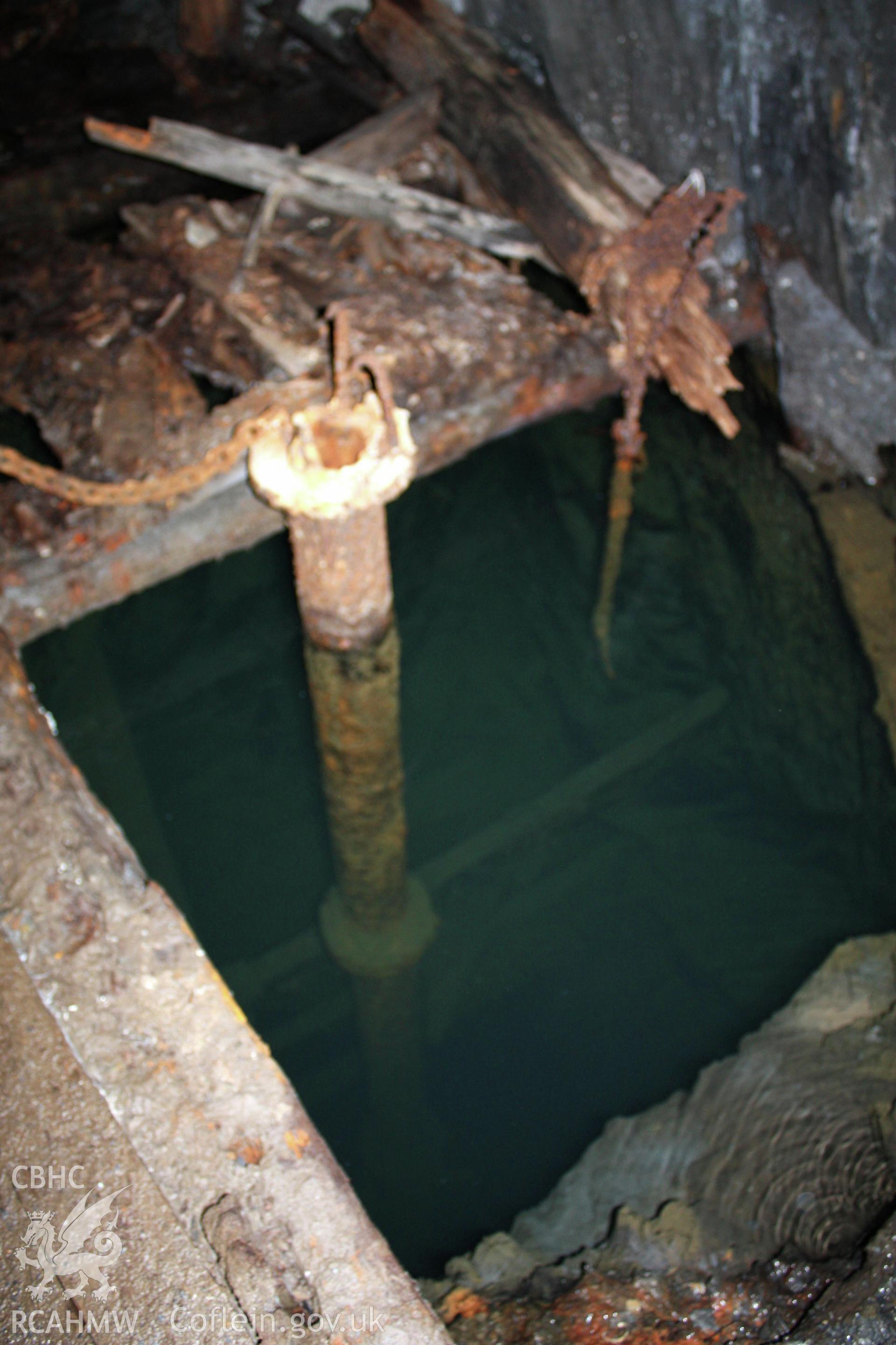 Ystrad Einion metal mine.  Underground shaft and pump rods.