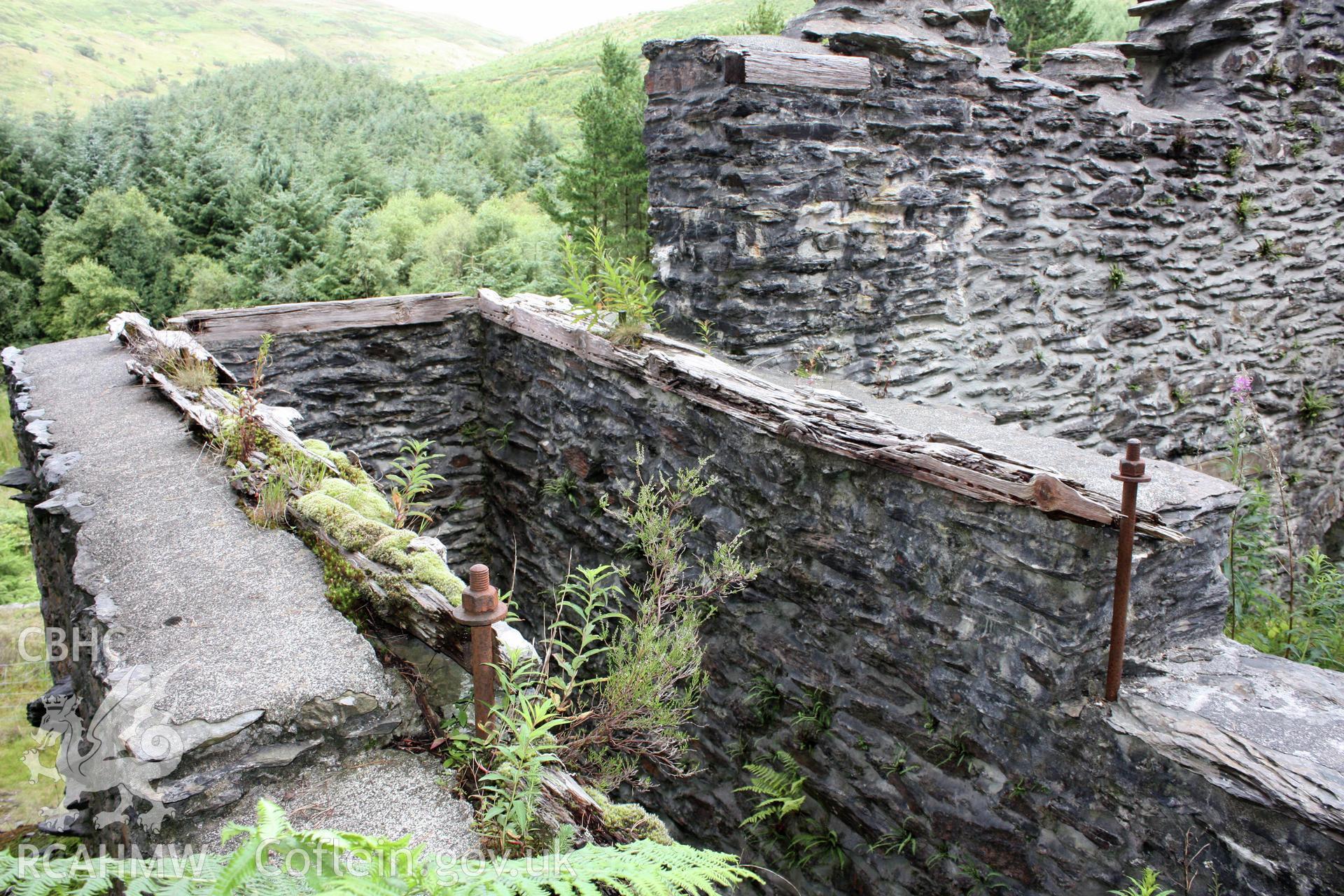 Ystrad Einion metal mine.  Detail of timberwork and holding down bolts of wheel pit 2.