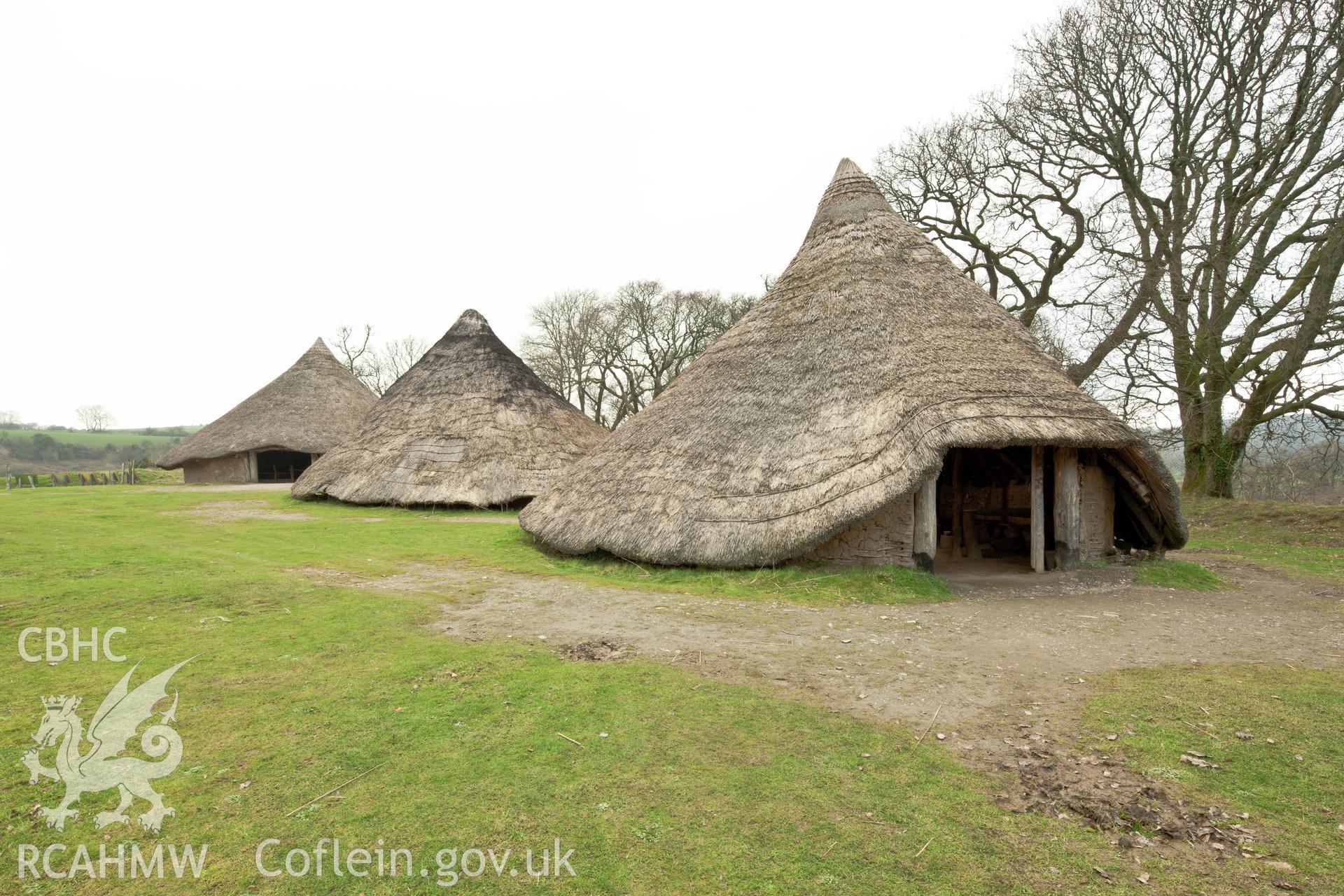 Reconstructed roundhouses, from the southeast. Castell Henllys, Iain Wright 17/01/2012