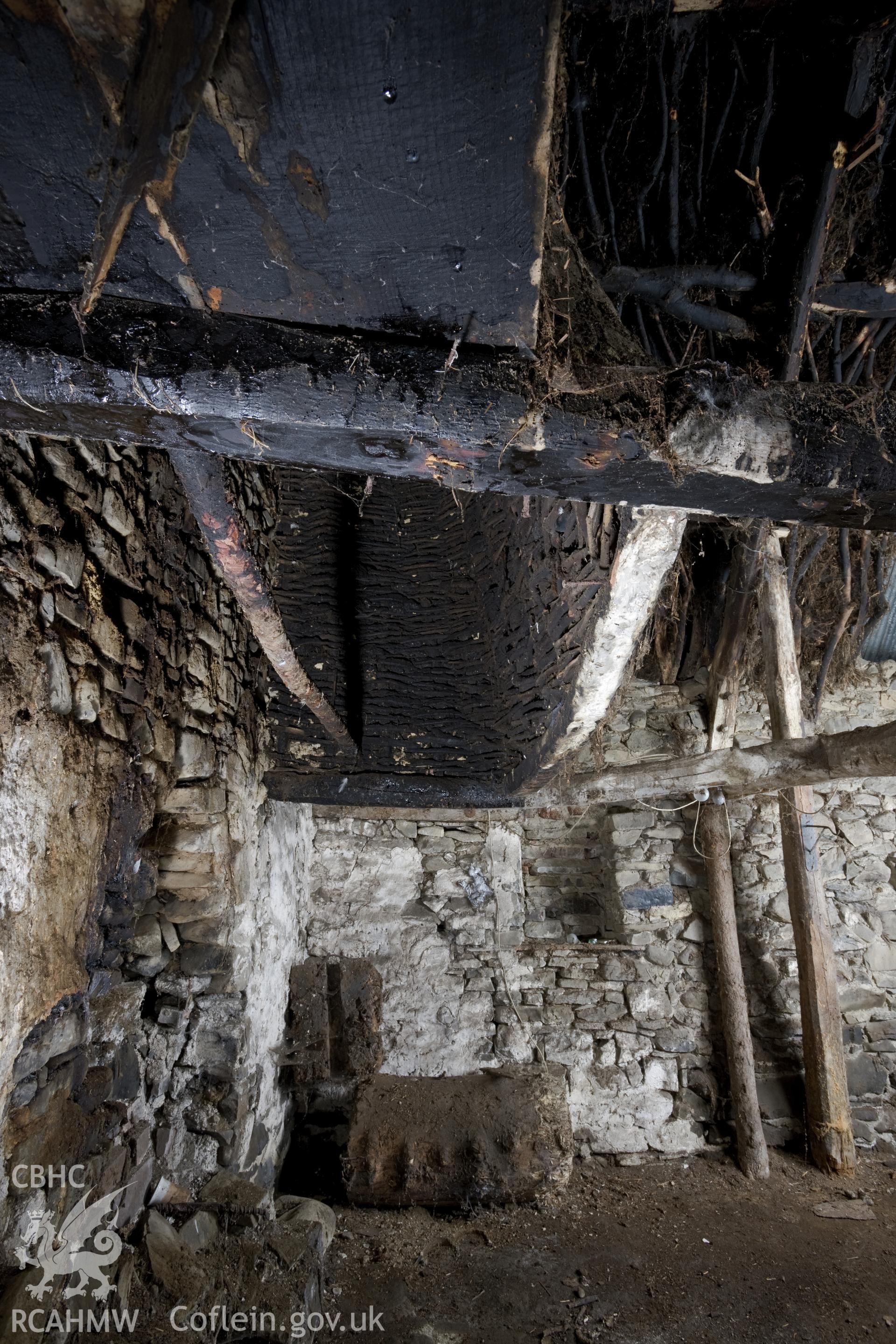 Interior view of Wigwen Fach showing the wicker fireplace hood.