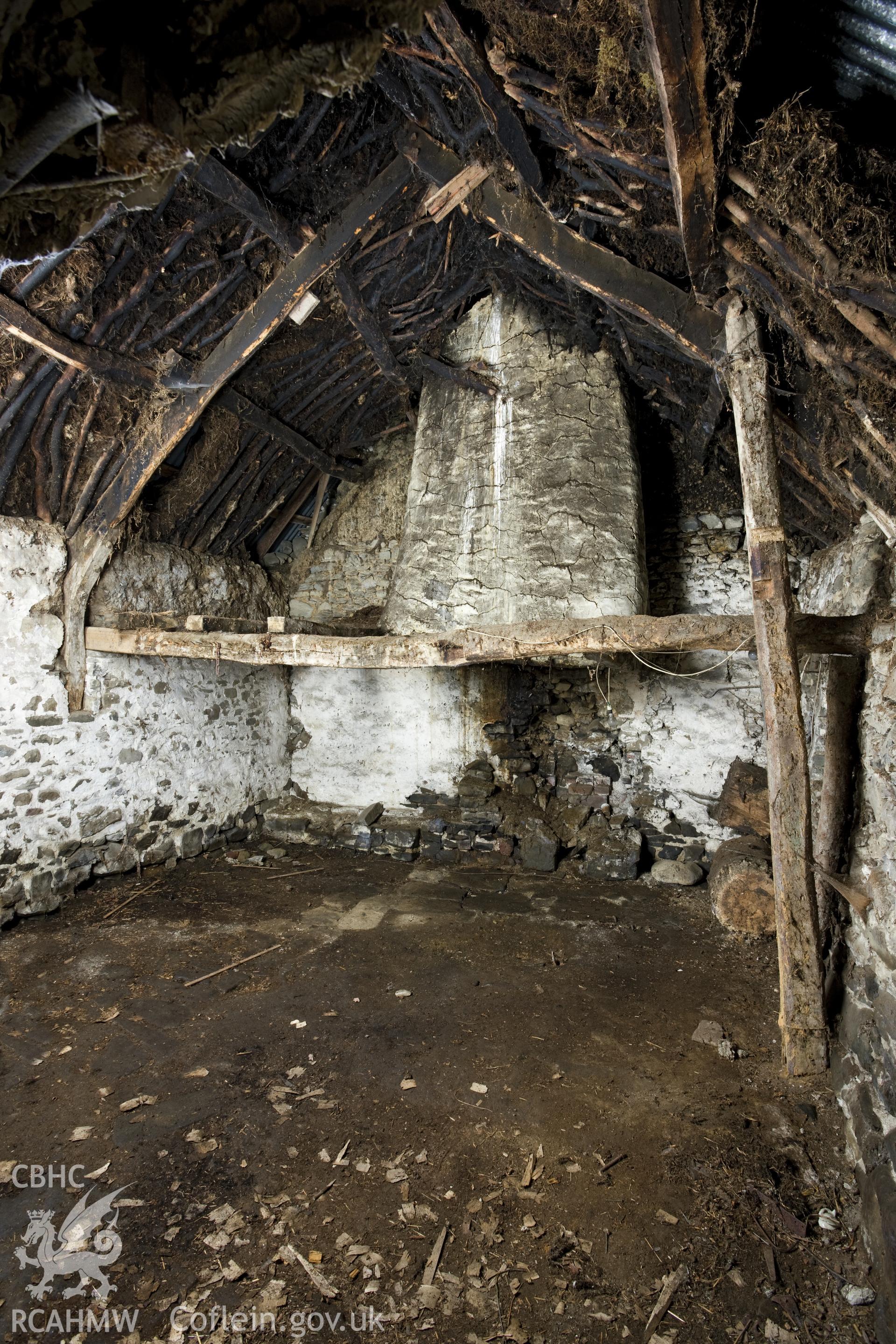 Interior view of Wigwen Fach showing the wicker fireplace hood.