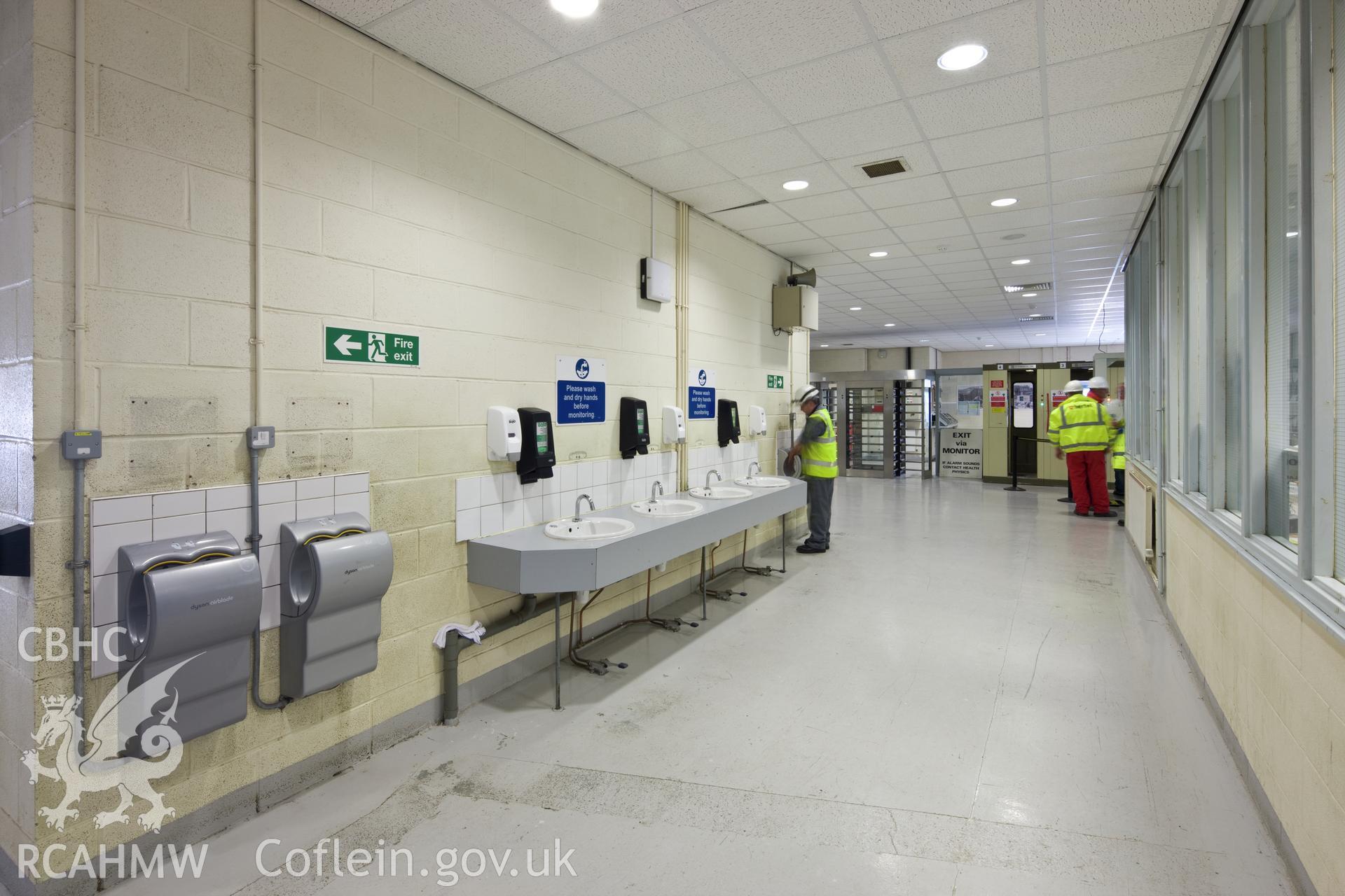 Hand dryers and basins. Workers must wash their hands when leaving (RCA) Radiation Controlled Areas.