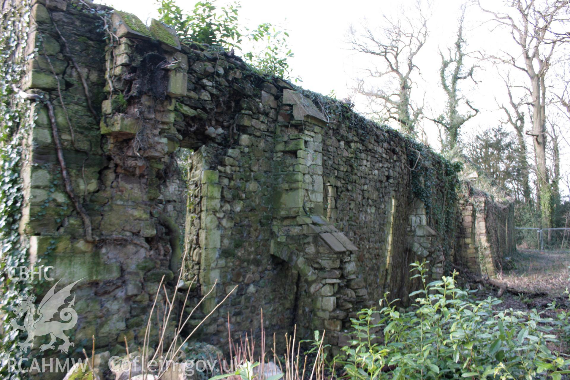 External; east end of north elevation showing collapses buttress and subsiding wall