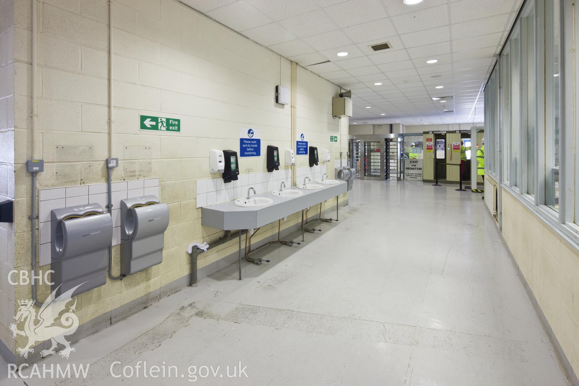 Hand dryers and basins. Workers must wash their hands when leaving (RCA) Radiation Controlled Areas.