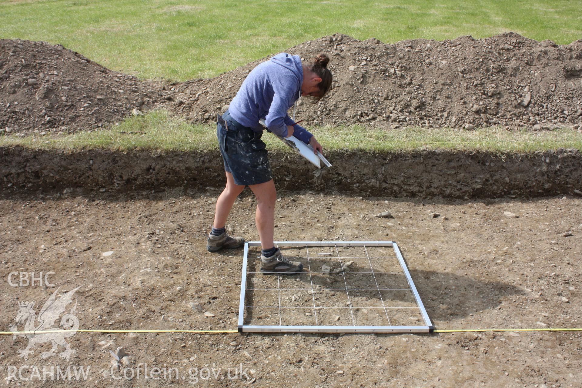 Abermagwr Roman villa; photographs of 2015 excavation season. L Barker (RCAHMW) planning in Trench F