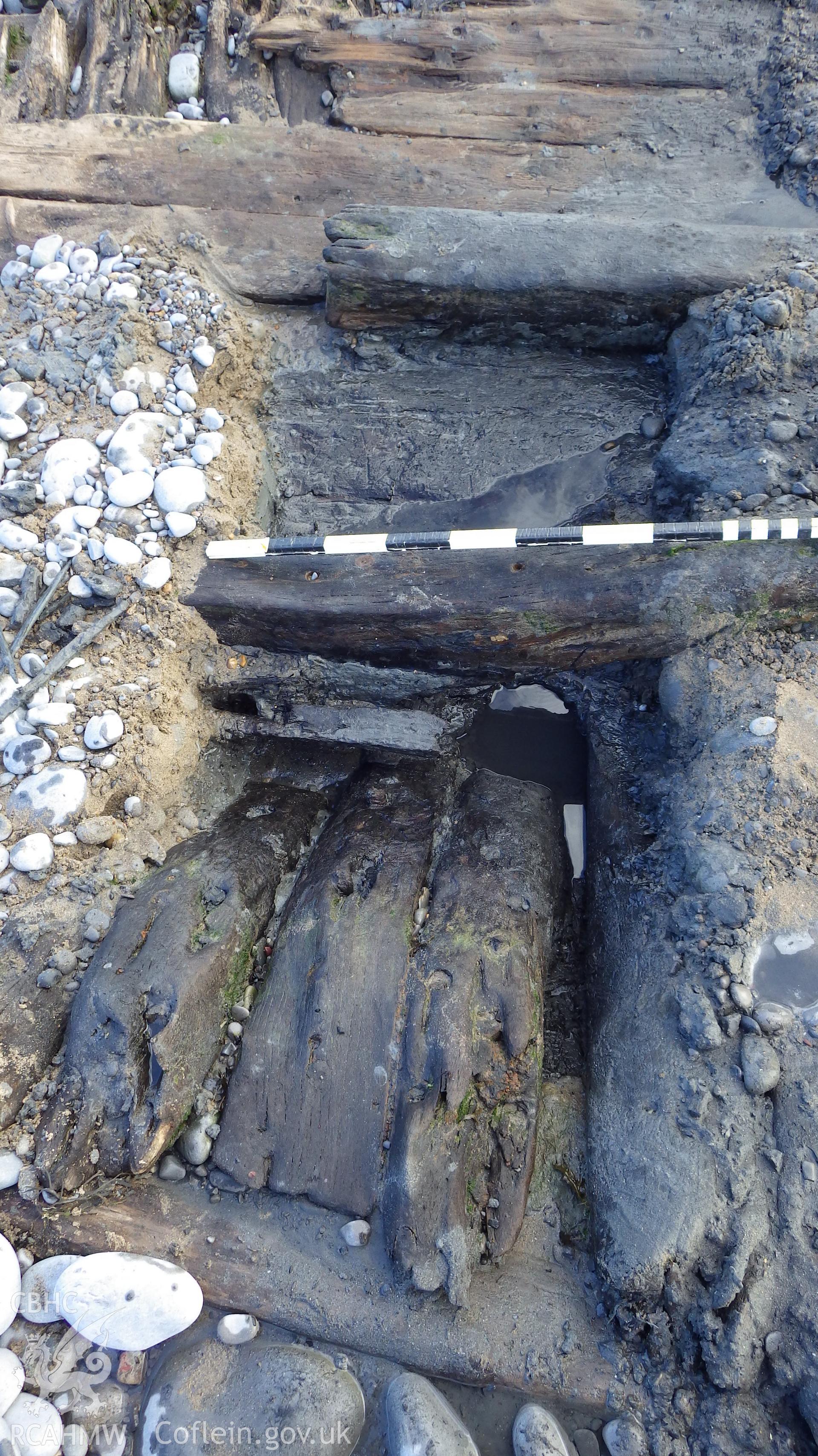 View into the base of the trial trench showing floors and beginning of cant framing towards the bow (?)