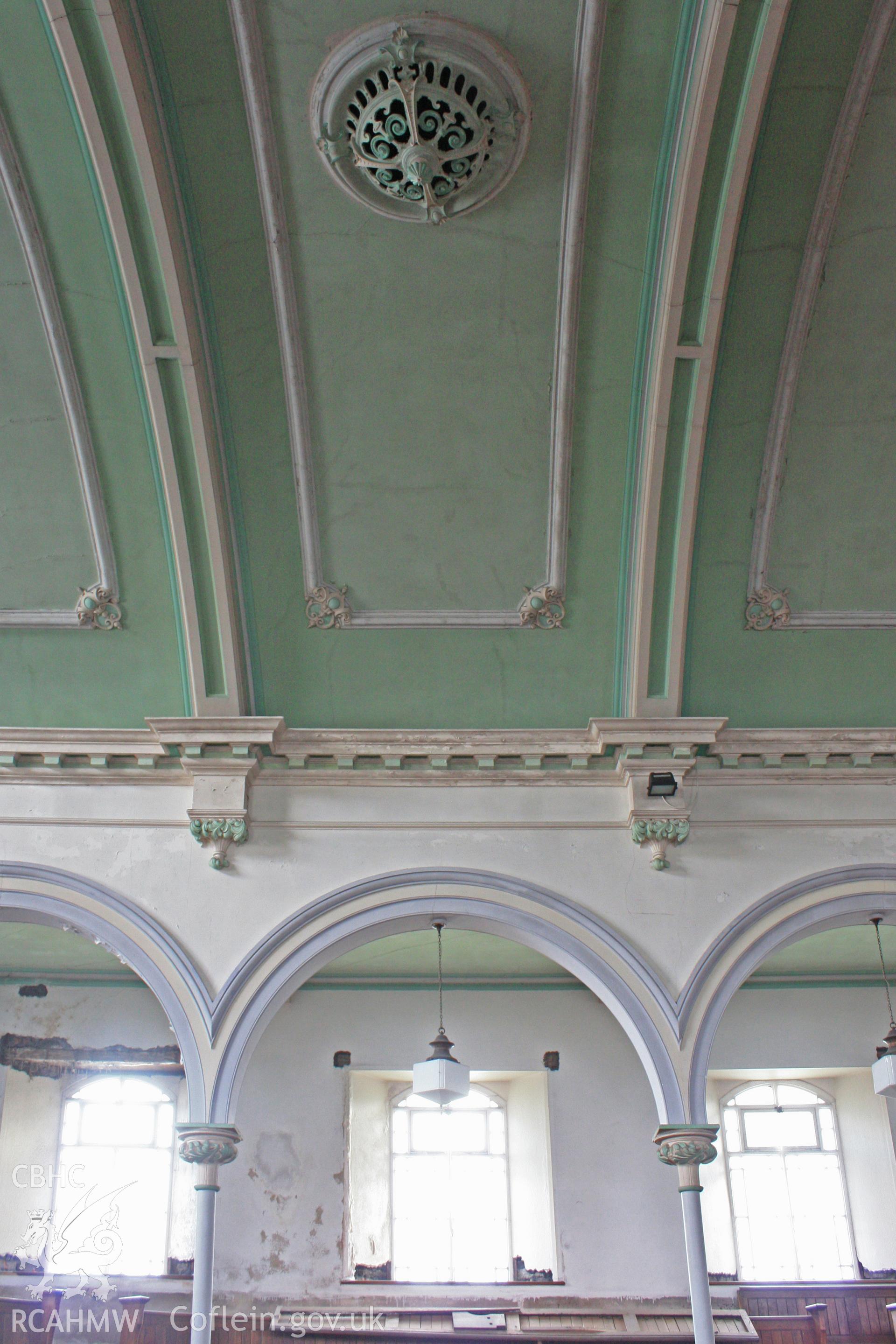 Detail of gallery arch and ceiling