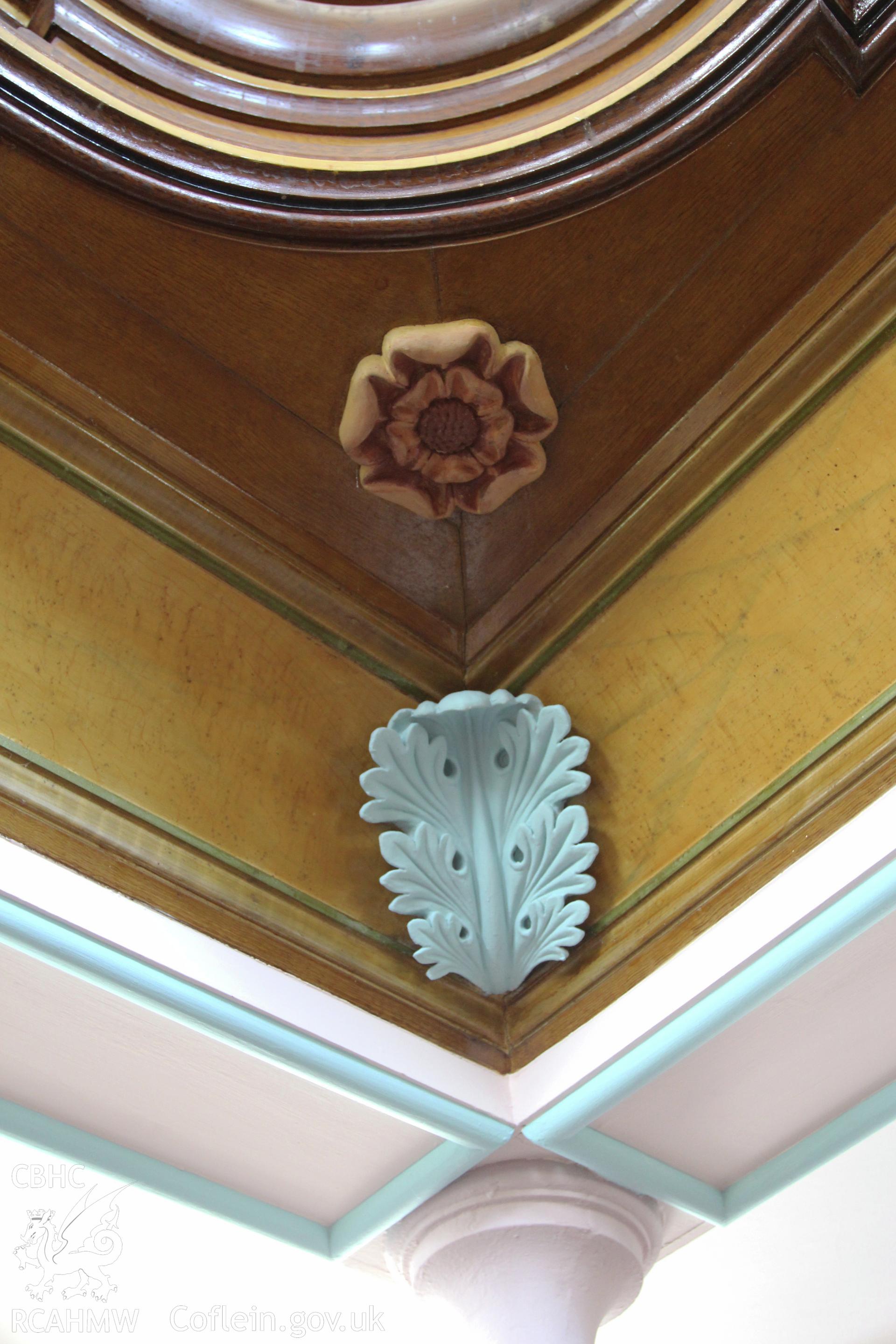 Detail of plaster acanthus leaf and carved timber detail on gallery front