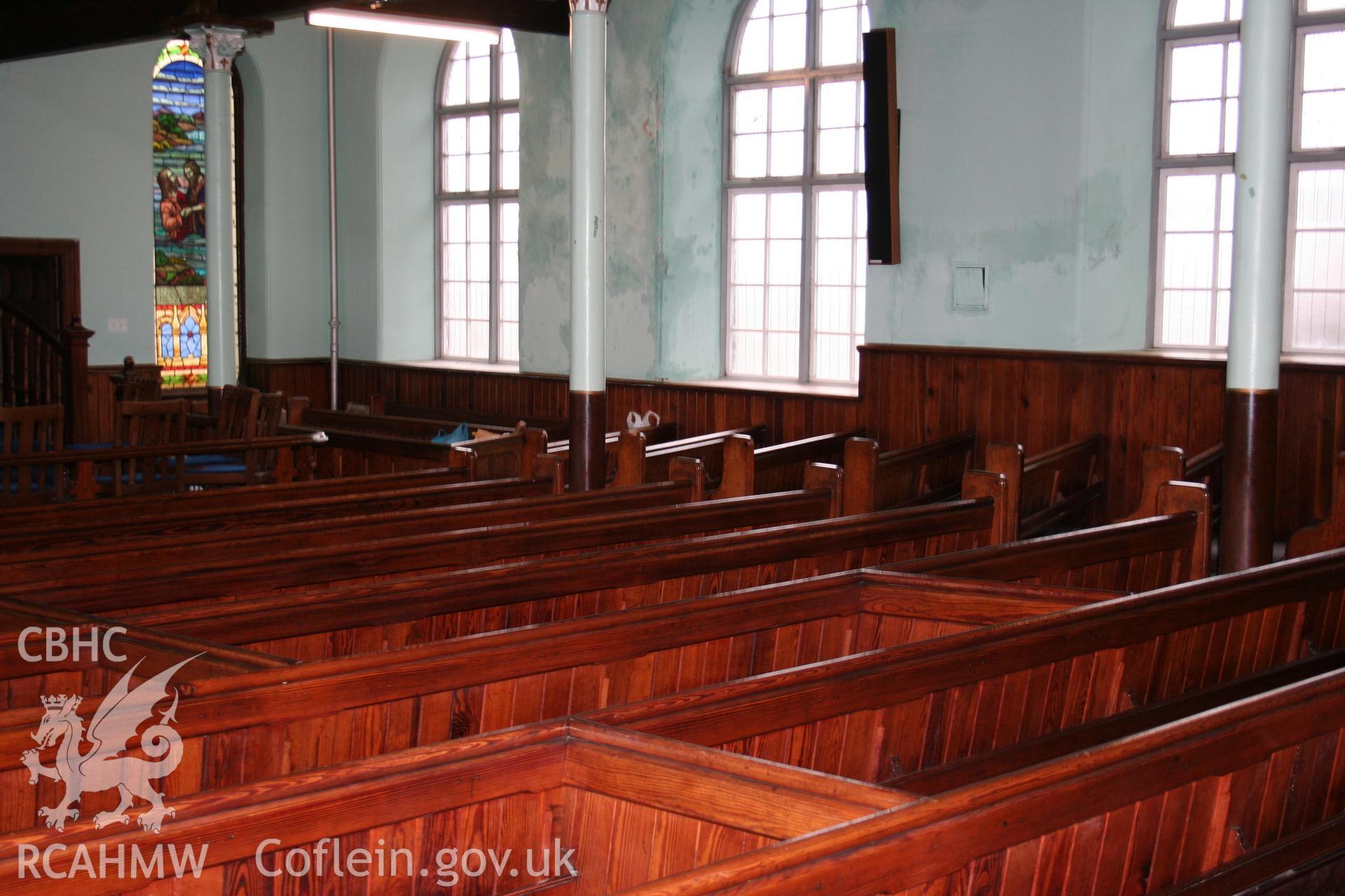 Hanbury Road baptist chapel, Bargoed, digital colour photograph showing interior - pews, received in the course of Emergency Recording case ref no RCS2/1/2247.