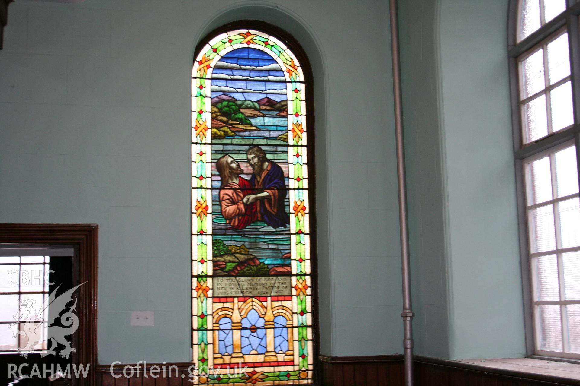 Hanbury Road baptist chapel, Bargoed, digital colour photograph showing interior - memorial window, received in the course of Emergency Recording case ref no RCS2/1/2247.