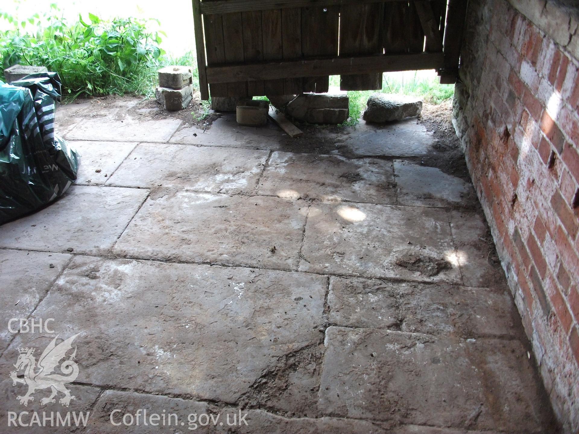 Colour digital photograph of interior of barn - floor; at Llangwm Isaf Farm, received in the course of Emergency Recording case ref no RCS2/1/1599.