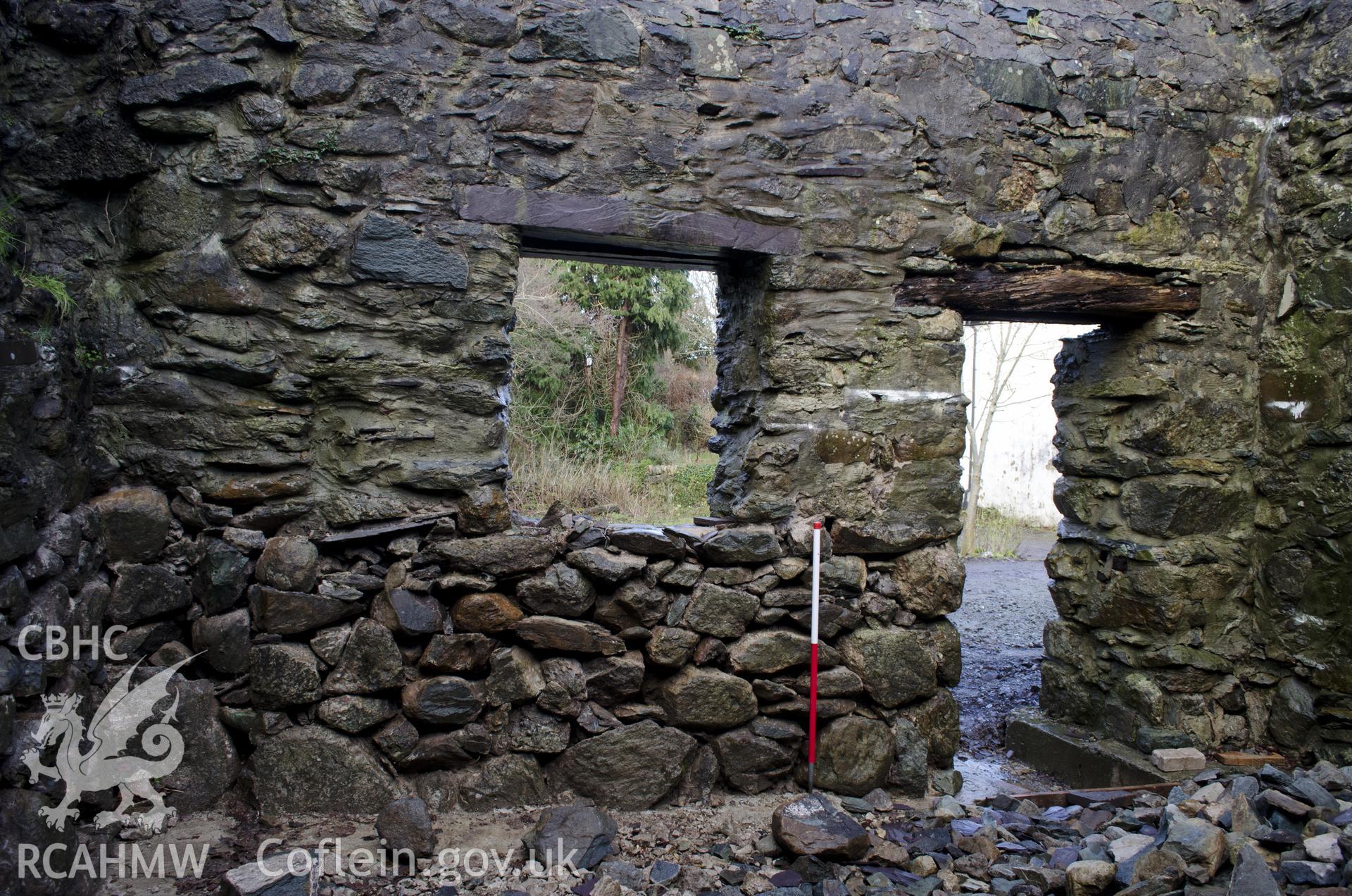 View from south showing NW wall of the SW room, taken by Jessica Davidson, Gwynedd Archaeological Trust, 8th Jan 2016.