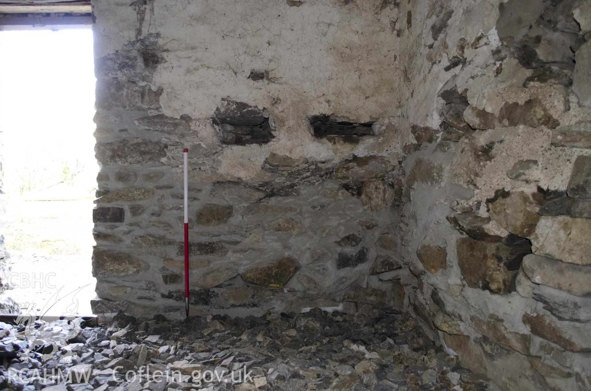 View from south-east showing NW wall of the NE room (NE side), taken by Jessica Davidson, Gwynedd Archaeological Trust, 8th Jan 2016.