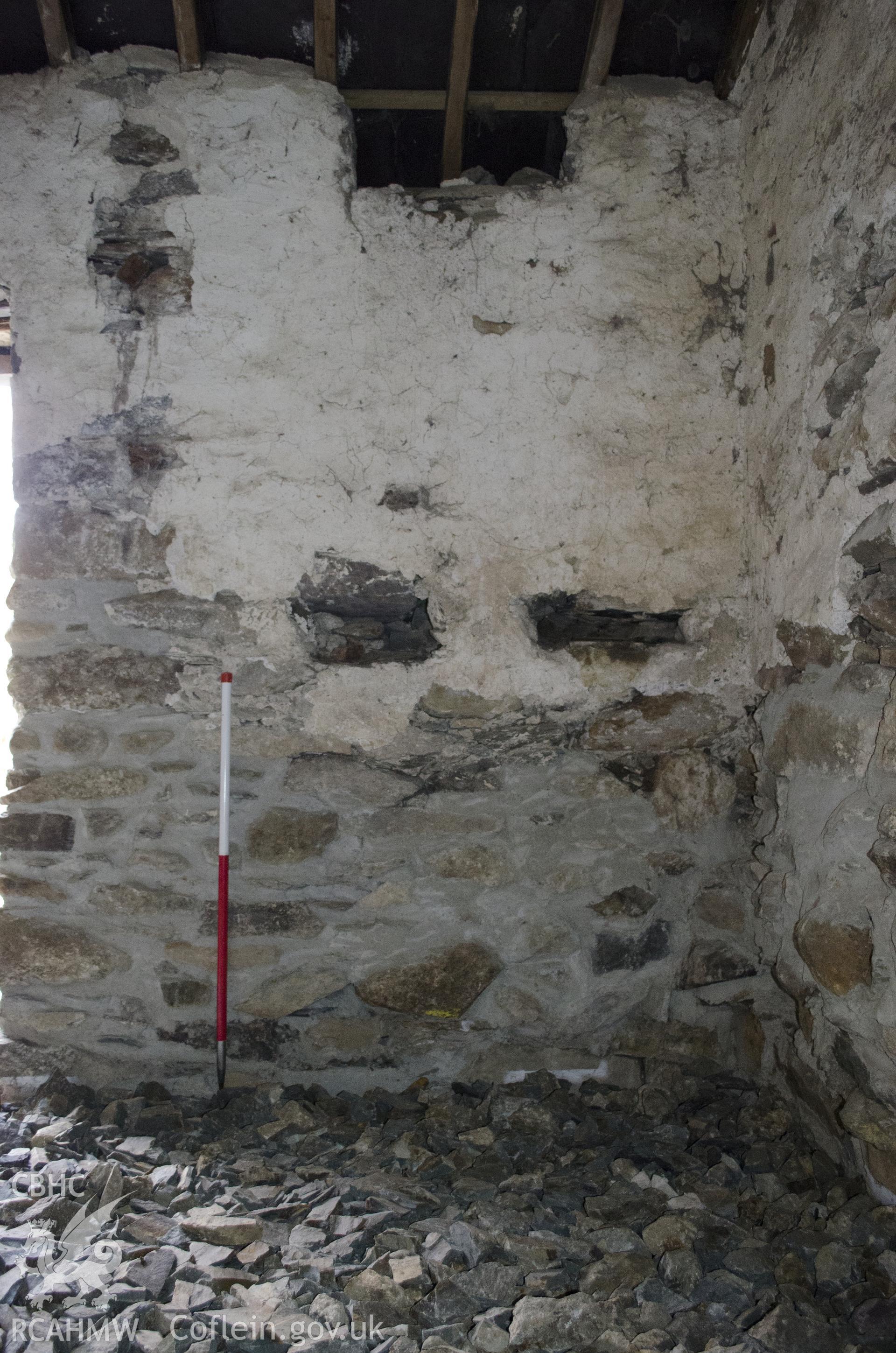 View from south-east showing NW wall of the NE room (NE side), taken by Jessica Davidson, Gwynedd Archaeological Trust, 8th Jan 2016.