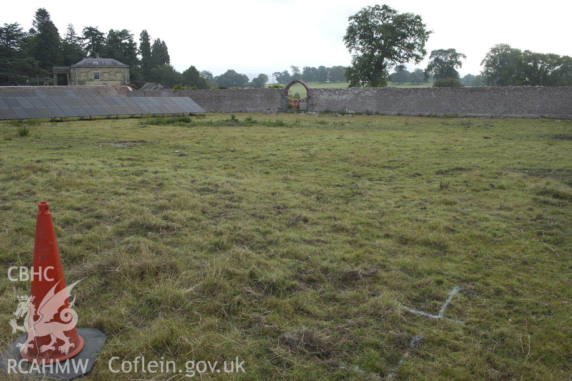 View from north-west showing pre-excavation view of tennis court,  kitchen garden.
