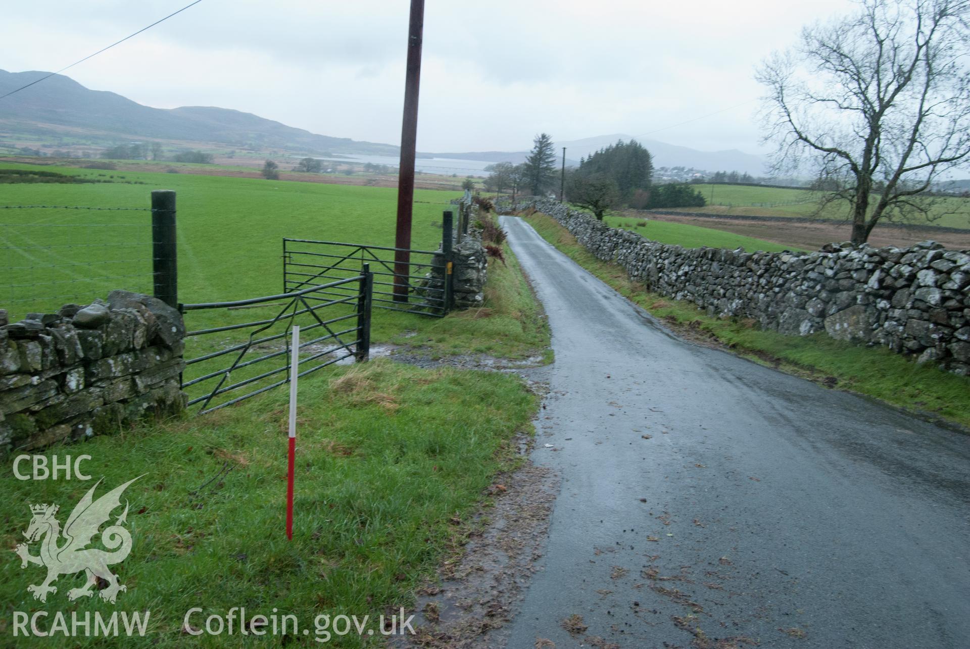 View from south-east, showing view along road opposite entrance to Bryn Llefrith farmhouse