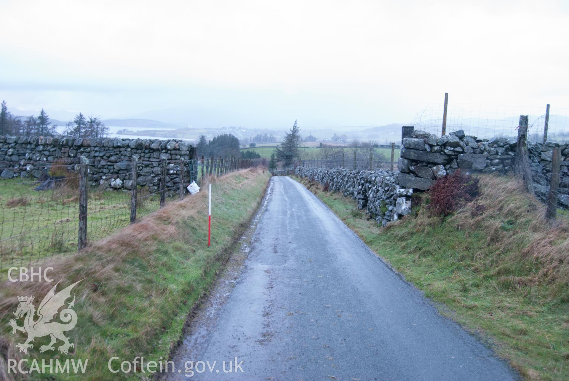 View from south, showing view along road, up from entrance to Bryn Llefrith.