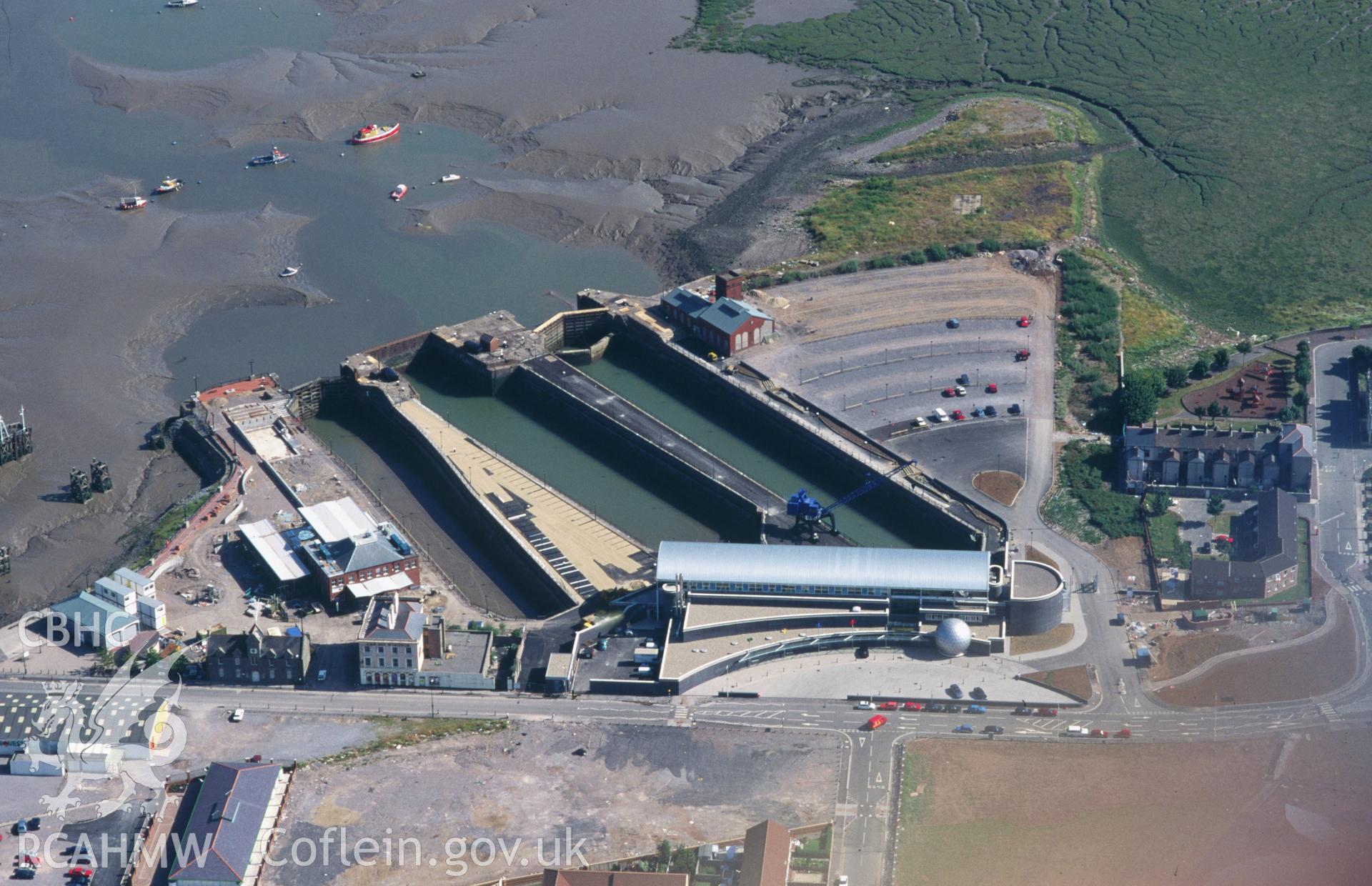 RCAHMW colour oblique aerial photograph of Mountstuart Shipbuilding Yard taken on 20/07/1995 by C.R. Musson