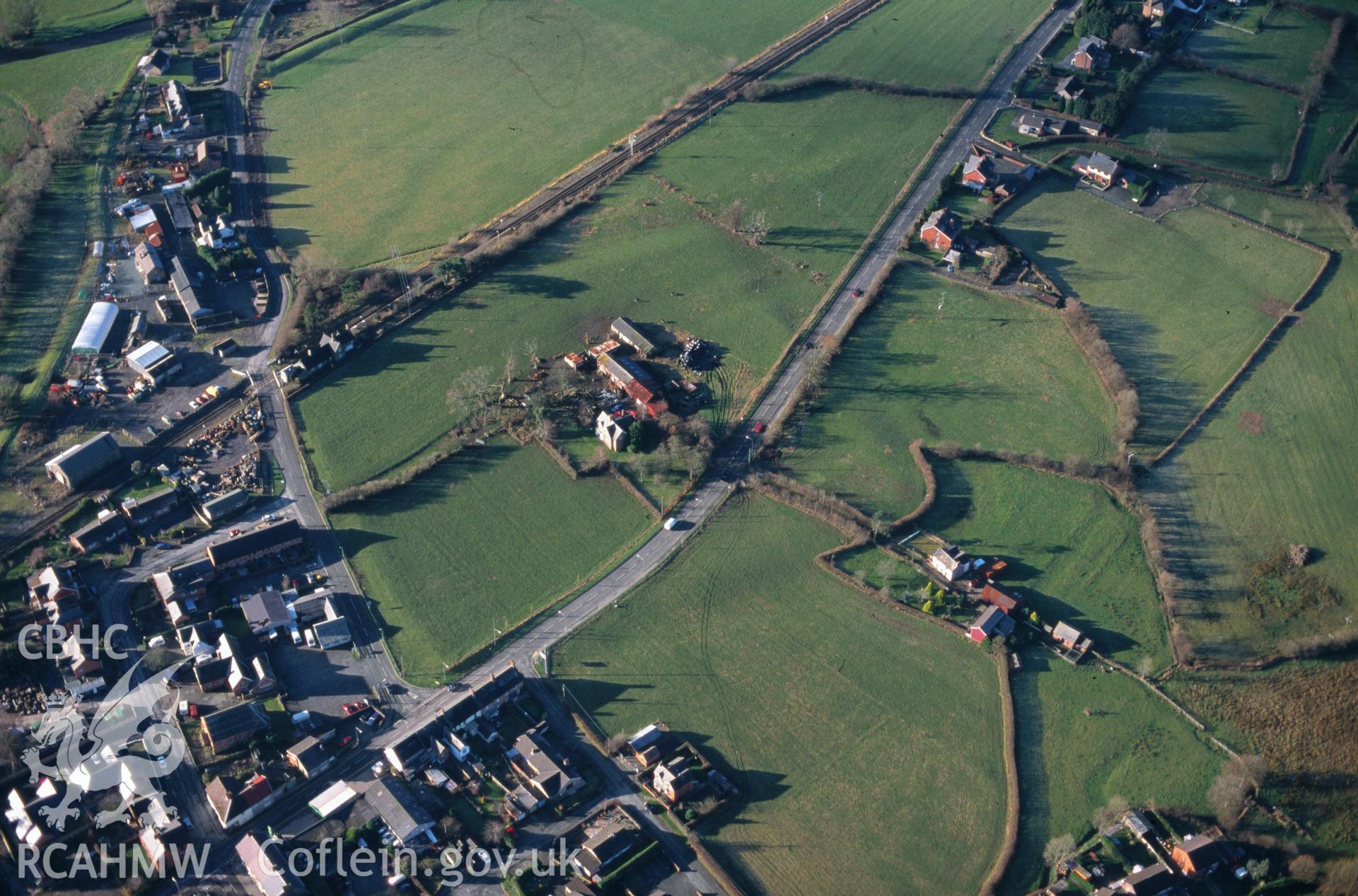 Slide of RCAHMW colour oblique aerial photograph of Caersws Roman Fort, taken by C.R. Musson, 20/12/1998.