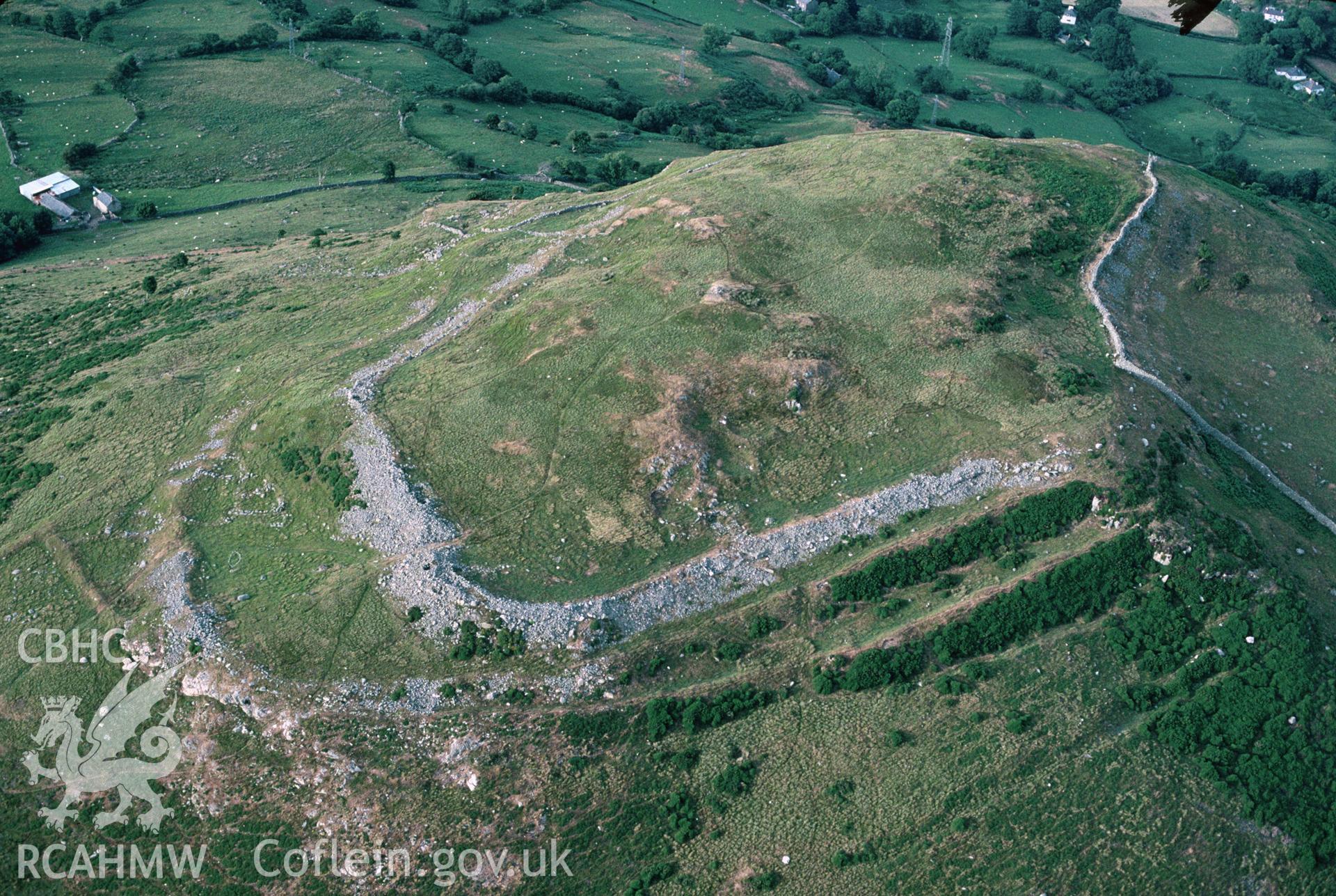Slide of RCAHMW colour oblique aerial photograph of Pen Y Gaer Camp, taken by C.R. Musson, 27/7/1996.