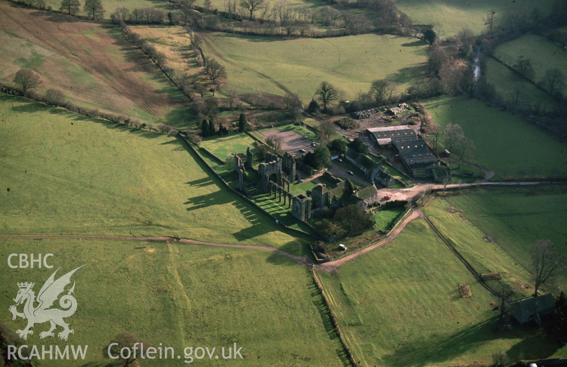 Slide of RCAHMW colour oblique aerial photograph of Llanthony Priory, taken by C.R. Musson, 7/12/1988.