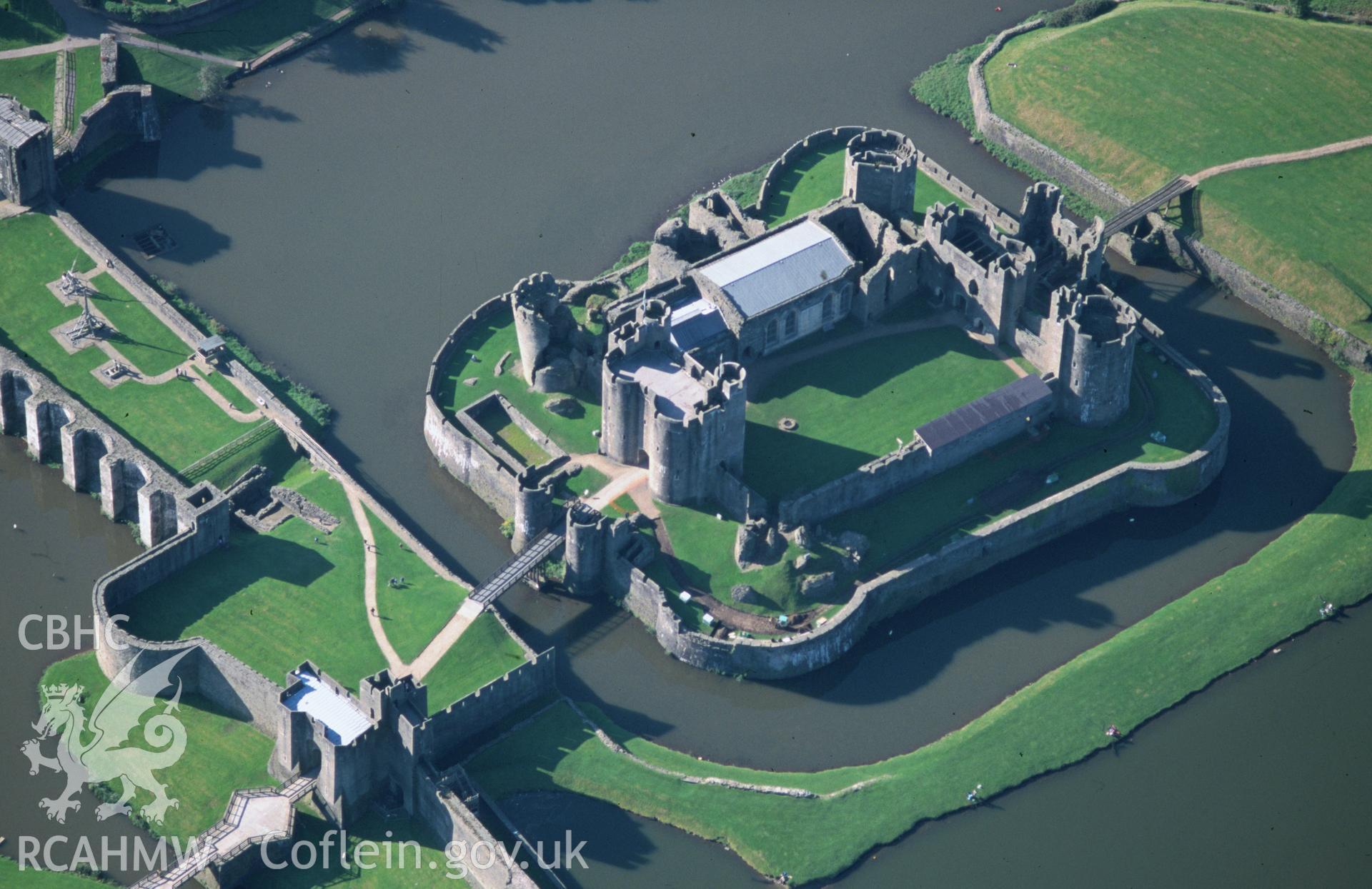 Slide of RCAHMW colour oblique aerial photograph of Caerphilly Castle, taken by T.G. Driver, 13/10/1999.