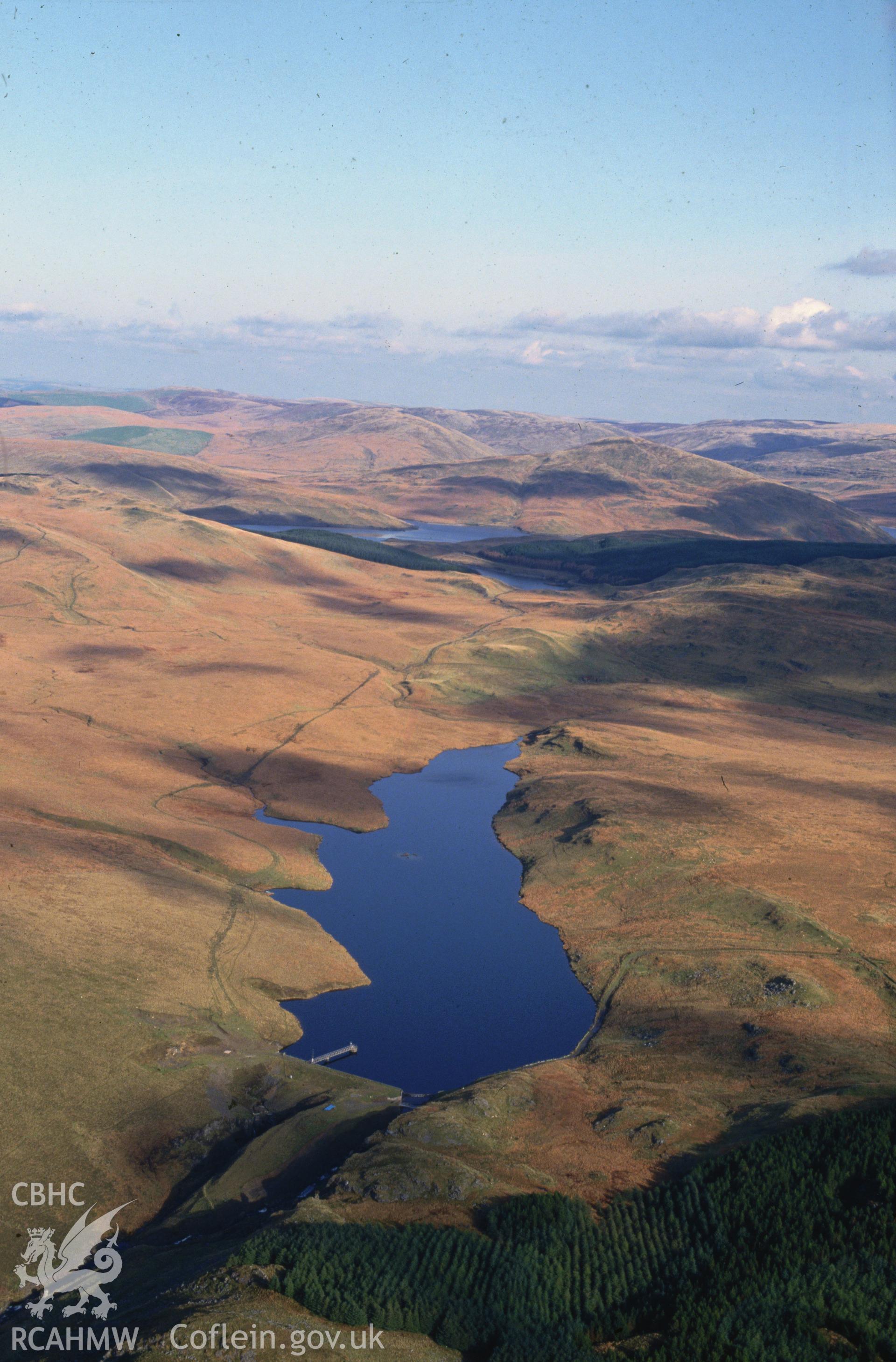 Slide of RCAHMW colour oblique aerial photograph of Llyn Craig Y Pistyll Reservoir, taken by C.R. Musson, 30/10/1992.
