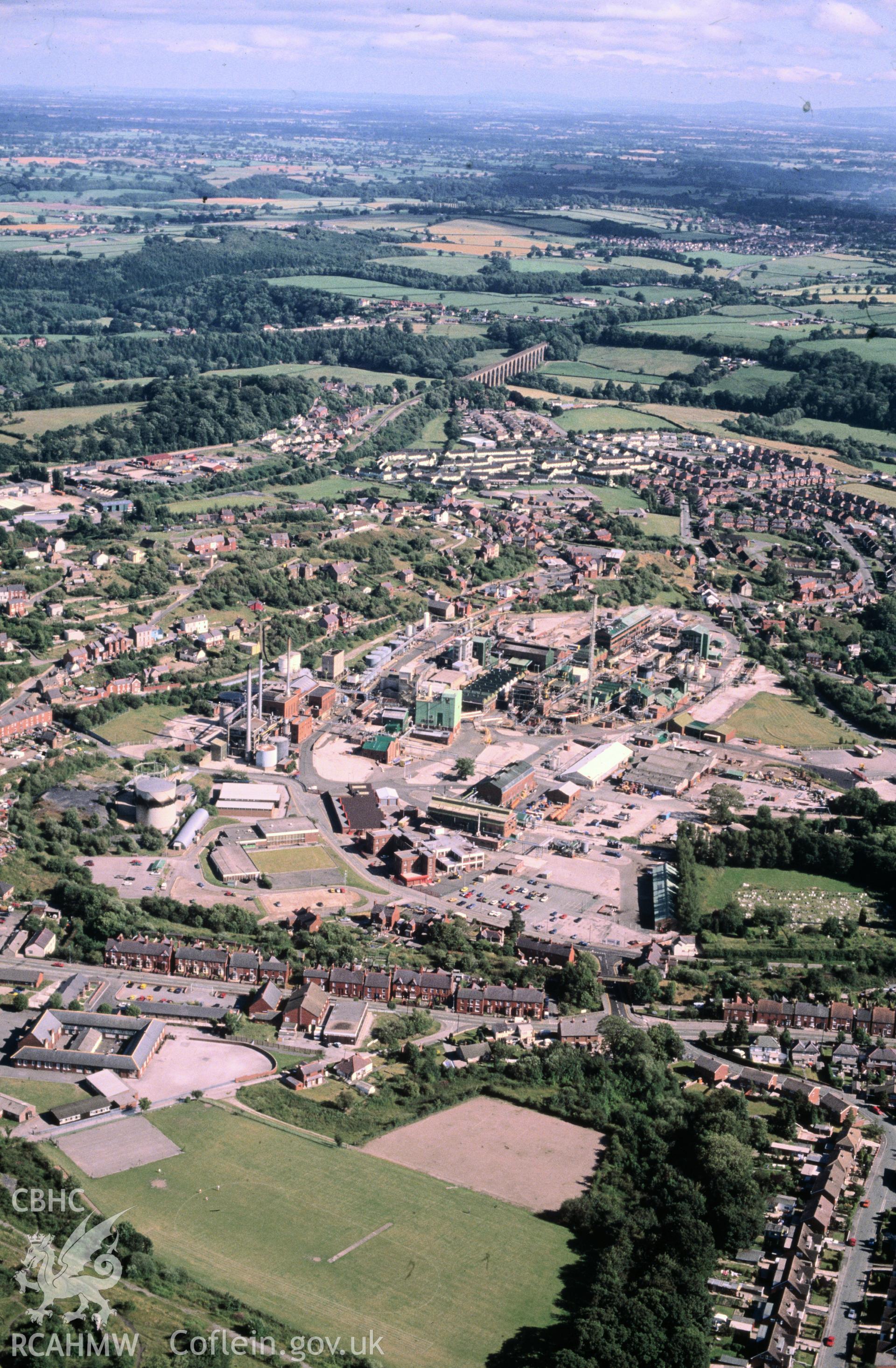 Slide of RCAHMW colour oblique aerial photograph of Monsanto Chemical Works, Ruabon, taken by C.R. Musson, 21/1/1988.