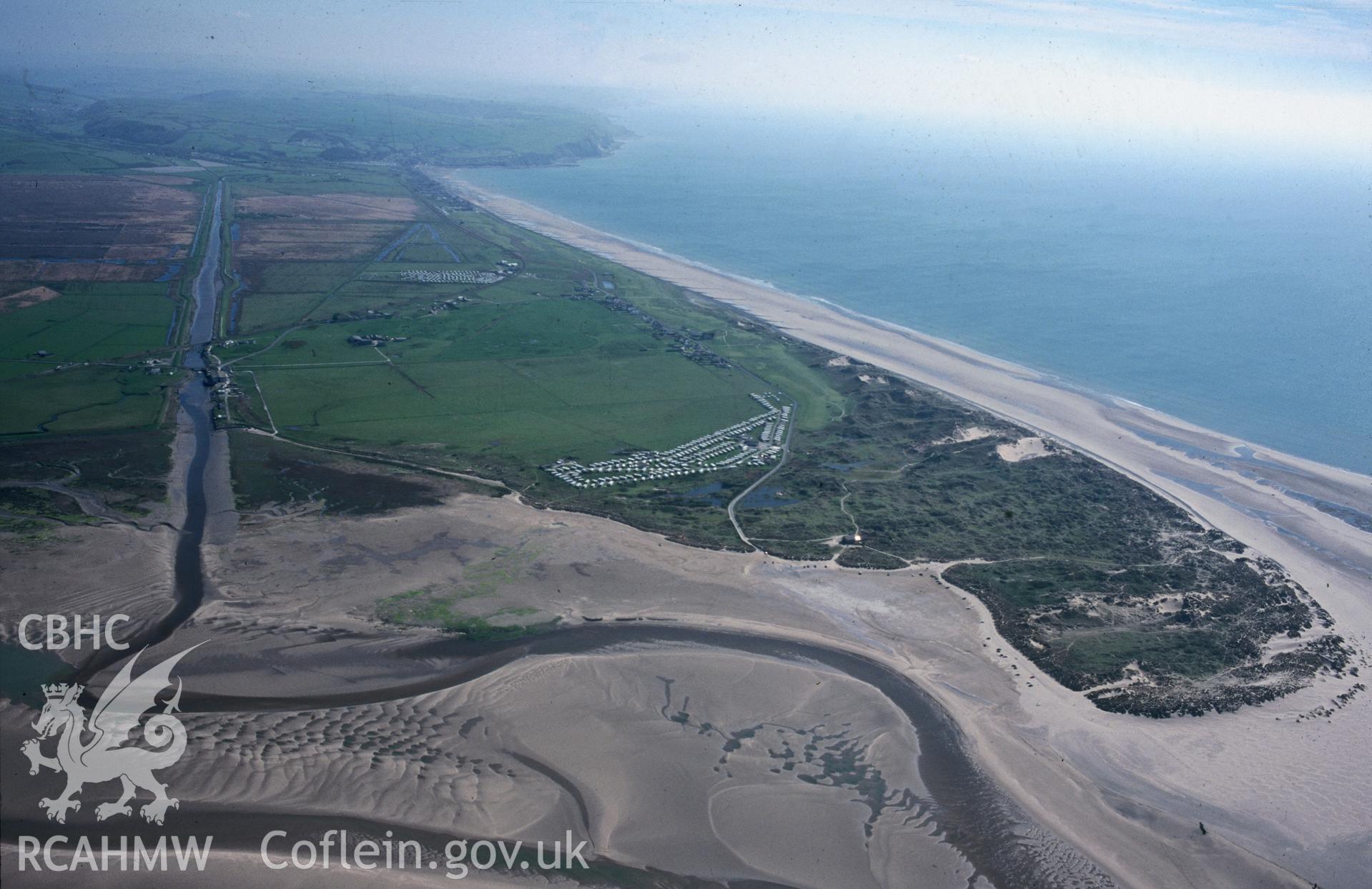 Slide of RCAHMW colour oblique aerial photograph of Ynyslas, Ynyshir National Nature Reserve, taken by T.G. Driver, 29/4/1999.