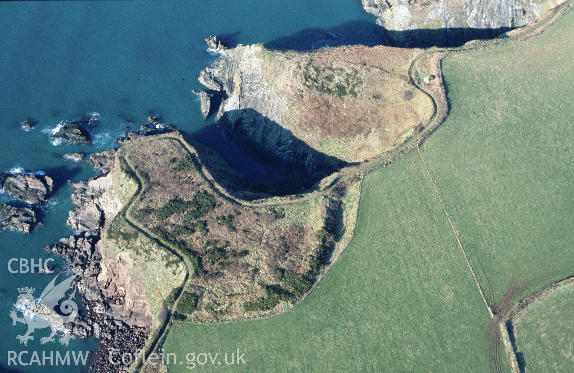 RCAHMW colour slide oblique aerial photograph of Mill Haven Rath, The Havens, taken by C.R.Musson on the 27/02/1996
