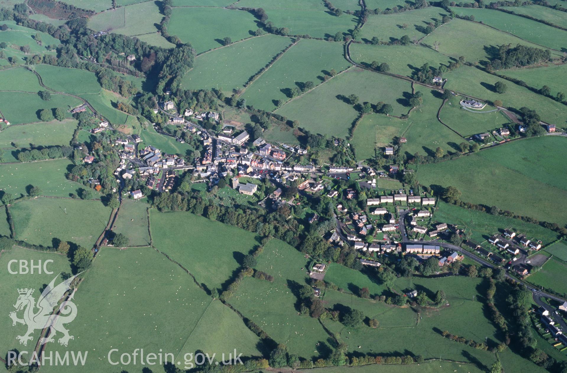 Slide of RCAHMW colour oblique aerial photograph of Llanrhaeadr Ym Mochnant, taken by T.G. Driver, 17/10/2000.