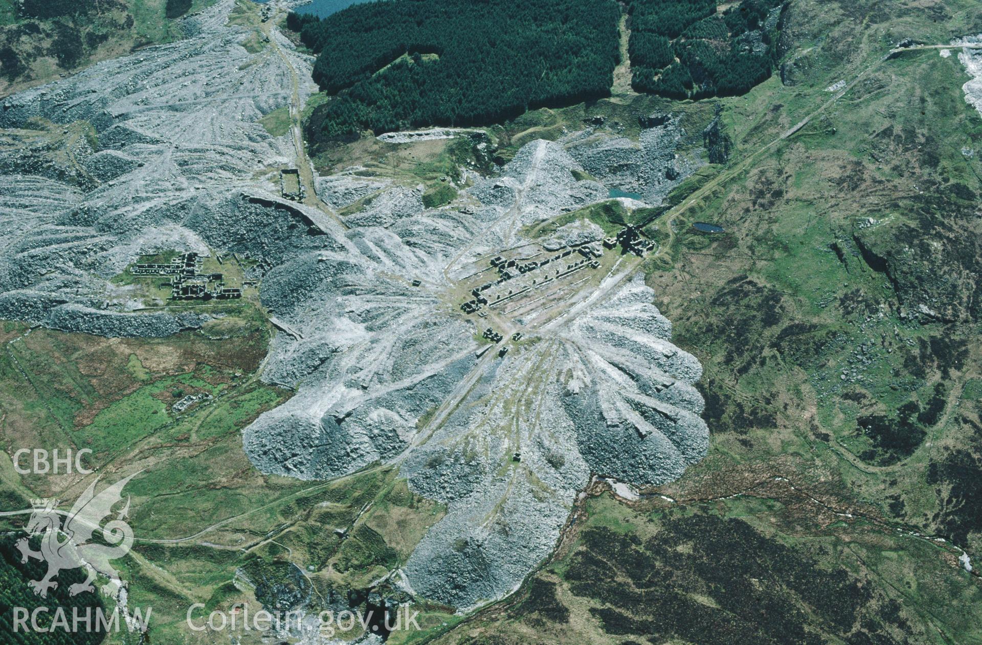 Slide of RCAHMW colour oblique aerial photograph of Rhiw-bach Slate Quarry, taken by C.R. Musson, 4/5/1999.