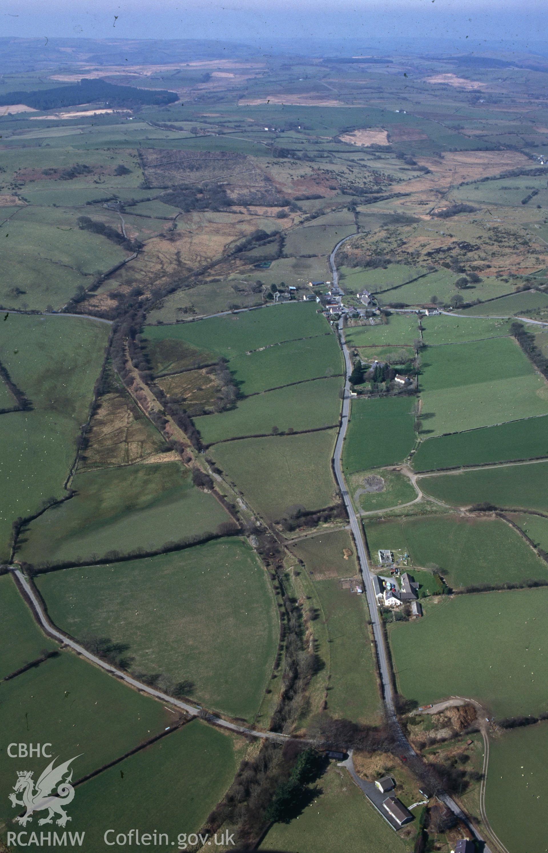 Slide of RCAHMW colour oblique aerial photograph of Ystradmeurig, taken by C.R. Musson, 23/3/1995.